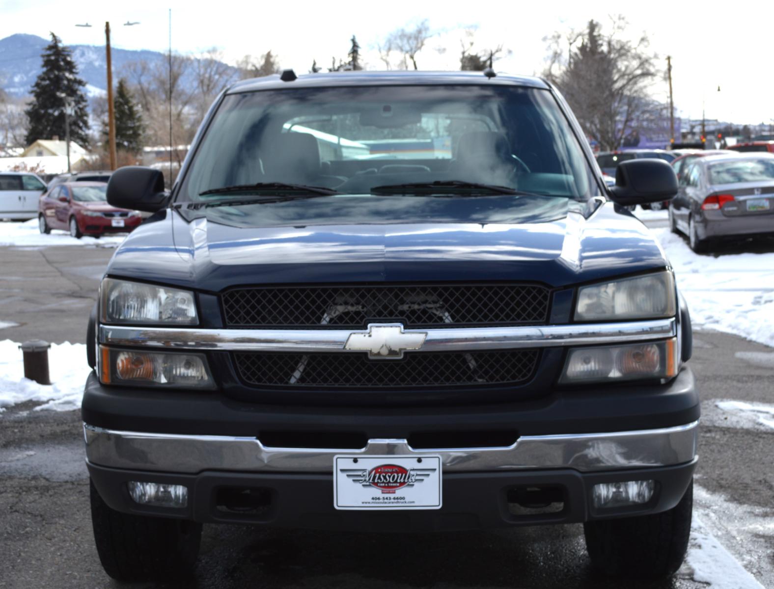 2004 Blue Chevrolet Avalanche 1500 4WD (3GNEK12T74G) with an 5.3L V8 OHV 16V engine, 4-Speed Automatic Overdrive transmission, located at 450 N Russell, Missoula, MT, 59801, (406) 543-6600, 46.874496, -114.017433 - Automatic Transmission. Air. Cruise. Tilt. Power Leather Seats. Heated Seats. Power Windows. Custom Wheels. Power Sunroof. Towing. - Photo #2