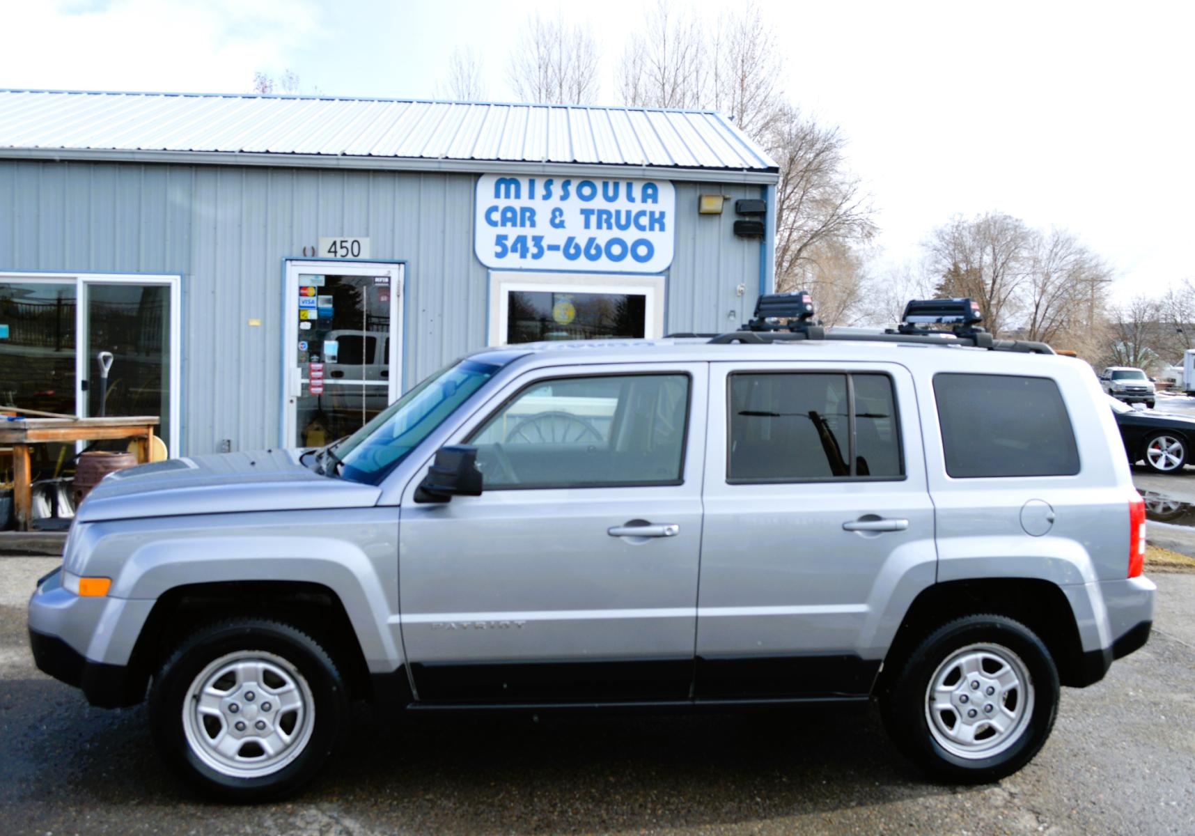 2015 Silver Jeep Patriot Sport 4WD (1C4NJRBB0FD) with an 2.4L L4 DOHC 16V engine, Automatic transmission, located at 450 N Russell, Missoula, MT, 59801, (406) 543-6600, 46.874496, -114.017433 - Nice Clean SUV. 4 Wheel Drive. Automatic Transmission. Air. Cruise. Tilt. Power Windows. - Photo #0