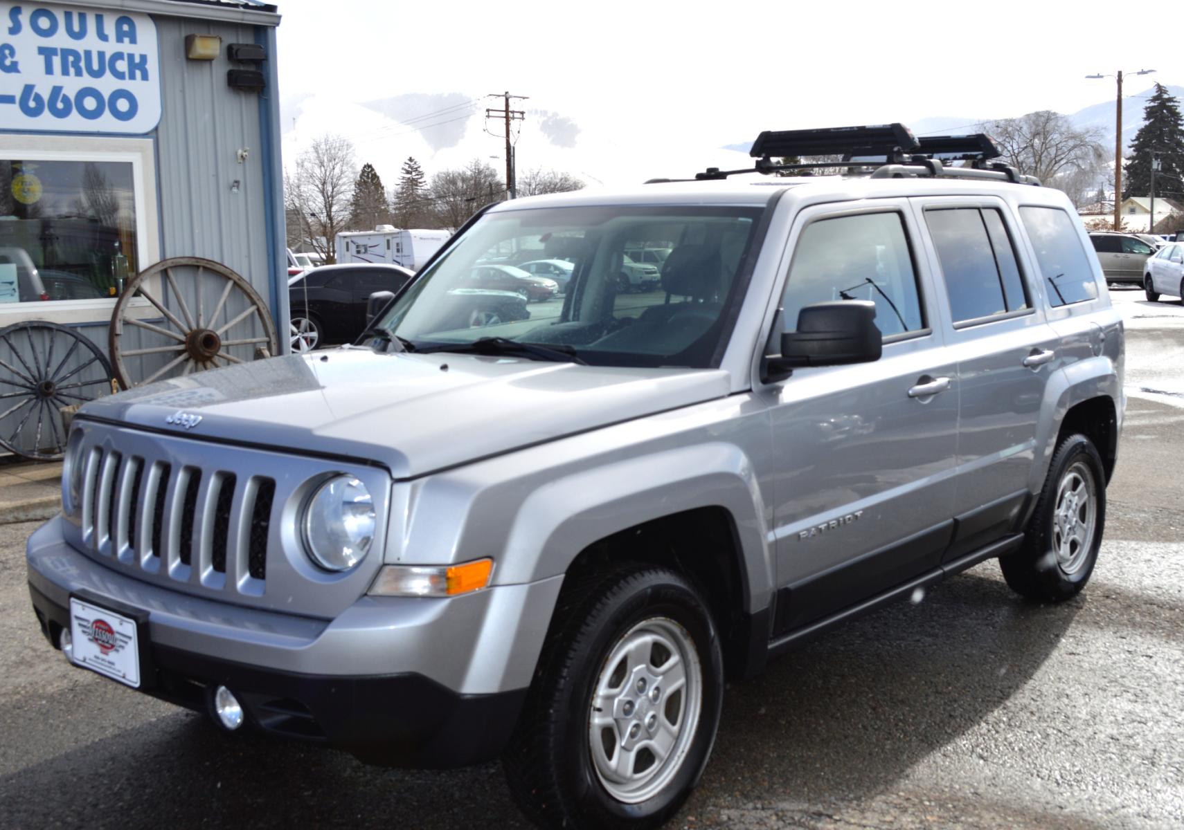 2015 Silver Jeep Patriot Sport 4WD (1C4NJRBB0FD) with an 2.4L L4 DOHC 16V engine, Automatic transmission, located at 450 N Russell, Missoula, MT, 59801, (406) 543-6600, 46.874496, -114.017433 - Nice Clean SUV. 4 Wheel Drive. Automatic Transmission. Air. Cruise. Tilt. Power Windows. - Photo #1