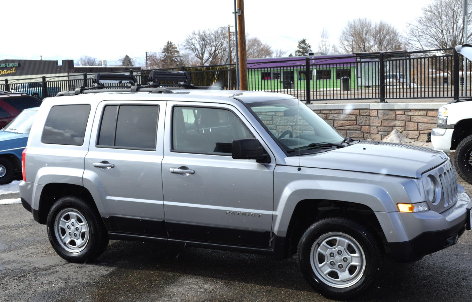 2015 Silver Jeep Patriot Sport 4WD (1C4NJRBB0FD) with an 2.4L L4 DOHC 16V engine, Automatic transmission, located at 450 N Russell, Missoula, MT, 59801, (406) 543-6600, 46.874496, -114.017433 - Nice Clean SUV. 4 Wheel Drive. Automatic Transmission. Air. Cruise. Tilt. Power Windows. - Photo #4