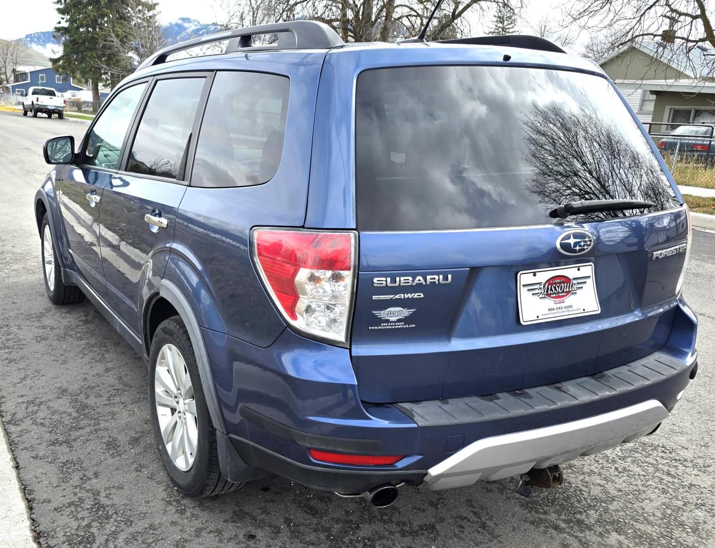 2011 Blue Subaru Forester 2.5X Premium (JF2SHBDC6BG) with an 2.5L H4 SOHC 16V engine, 5-Speed Manual transmission, located at 450 N Russell, Missoula, MT, 59801, (406) 543-6600, 46.874496, -114.017433 - All Wheel Drive. 2.5L H4 Engine. 5 Speed Manual Transmission. Air. Cruise. Tilt. Power Drivers Seat. Power Sun Roof. Heated Seats. Timing Chain, not a Timing Belt. Clean Title and Carfax. - Photo#5