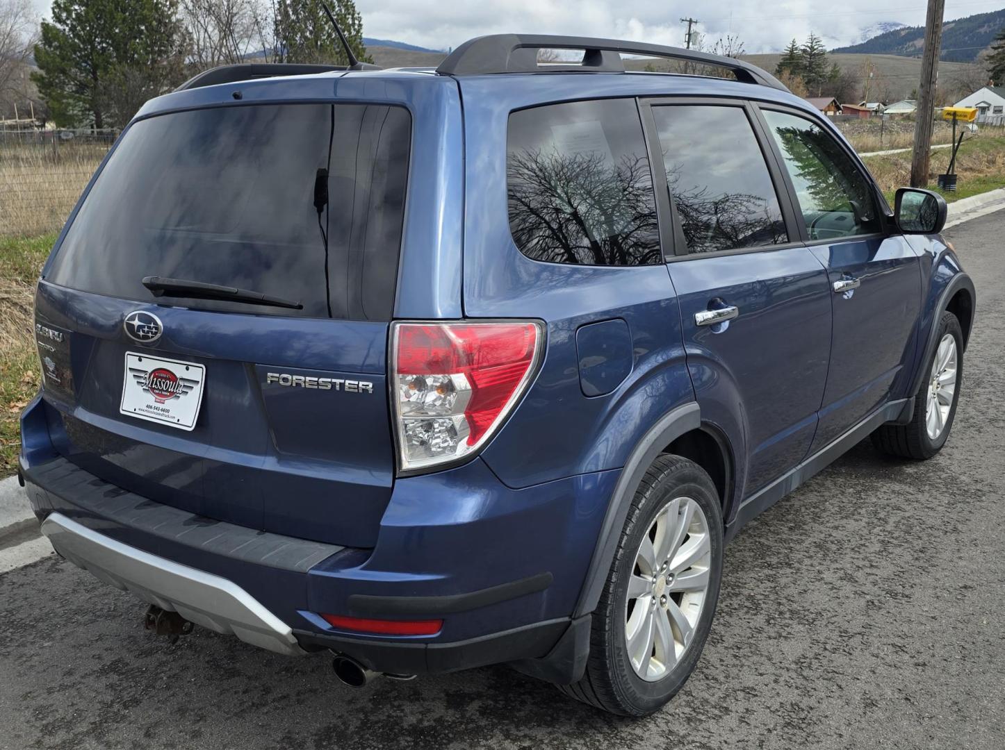 2011 Blue Subaru Forester 2.5X Premium (JF2SHBDC6BG) with an 2.5L H4 SOHC 16V engine, 5-Speed Manual transmission, located at 450 N Russell, Missoula, MT, 59801, (406) 543-6600, 46.874496, -114.017433 - All Wheel Drive. 2.5L H4 Engine. 5 Speed Manual Transmission. Air. Cruise. Tilt. Power Drivers Seat. Power Sun Roof. Heated Seats. Timing Chain, not a Timing Belt. Clean Title and Carfax. - Photo#6