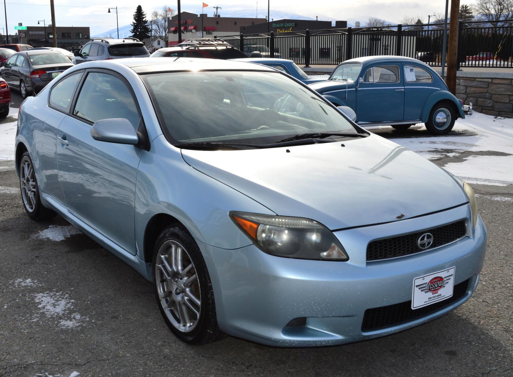 2006 Blue Scion tC Sport Coupe (JTKDE177460) with an 2.4L L4 DOHC 16V engine, 5-Speed Manual transmission, located at 450 N Russell, Missoula, MT, 59801, (406) 543-6600, 46.874496, -114.017433 - Photo #2