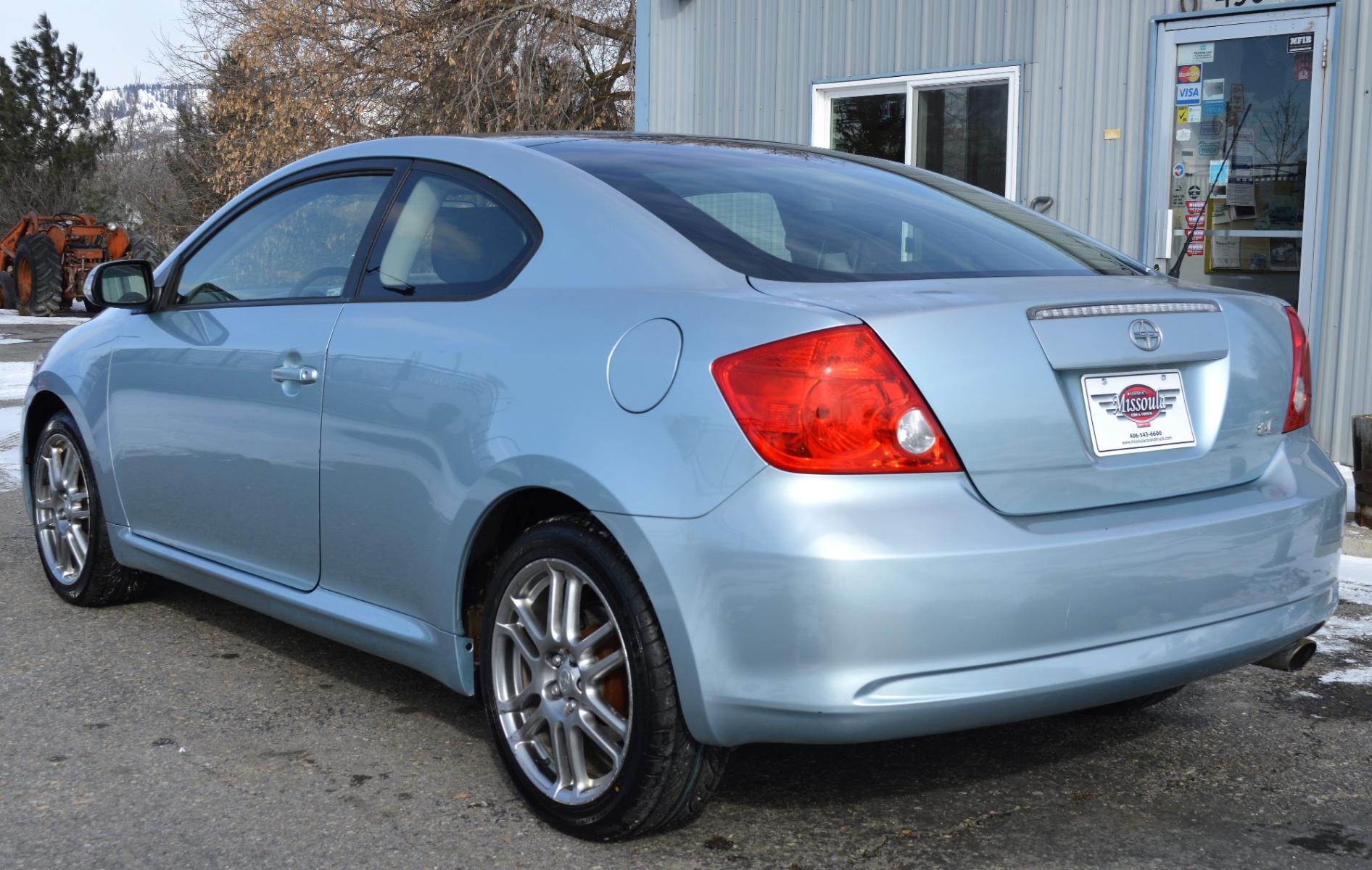 2006 Blue Scion tC Sport Coupe (JTKDE177460) with an 2.4L L4 DOHC 16V engine, 5-Speed Manual transmission, located at 450 N Russell, Missoula, MT, 59801, (406) 543-6600, 46.874496, -114.017433 - Photo #5
