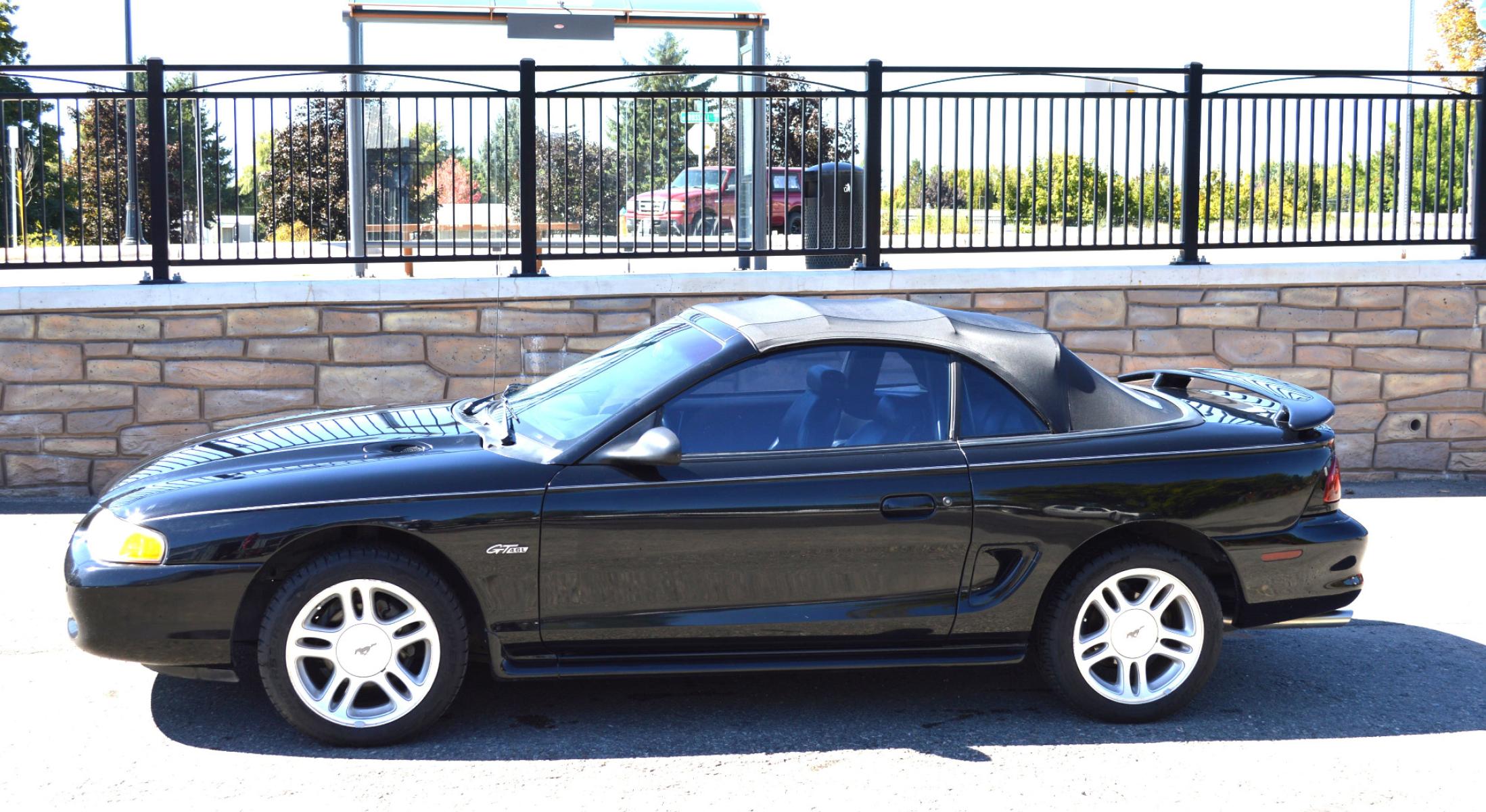 1998 Black Ford Mustang GT Convertible (1FAFP45X0WF) with an 4.6L V8 SOHC 16V engine, Automatic transmission, located at 450 N Russell, Missoula, MT, 59801, (406) 543-6600, 46.874496, -114.017433 - Photo #1