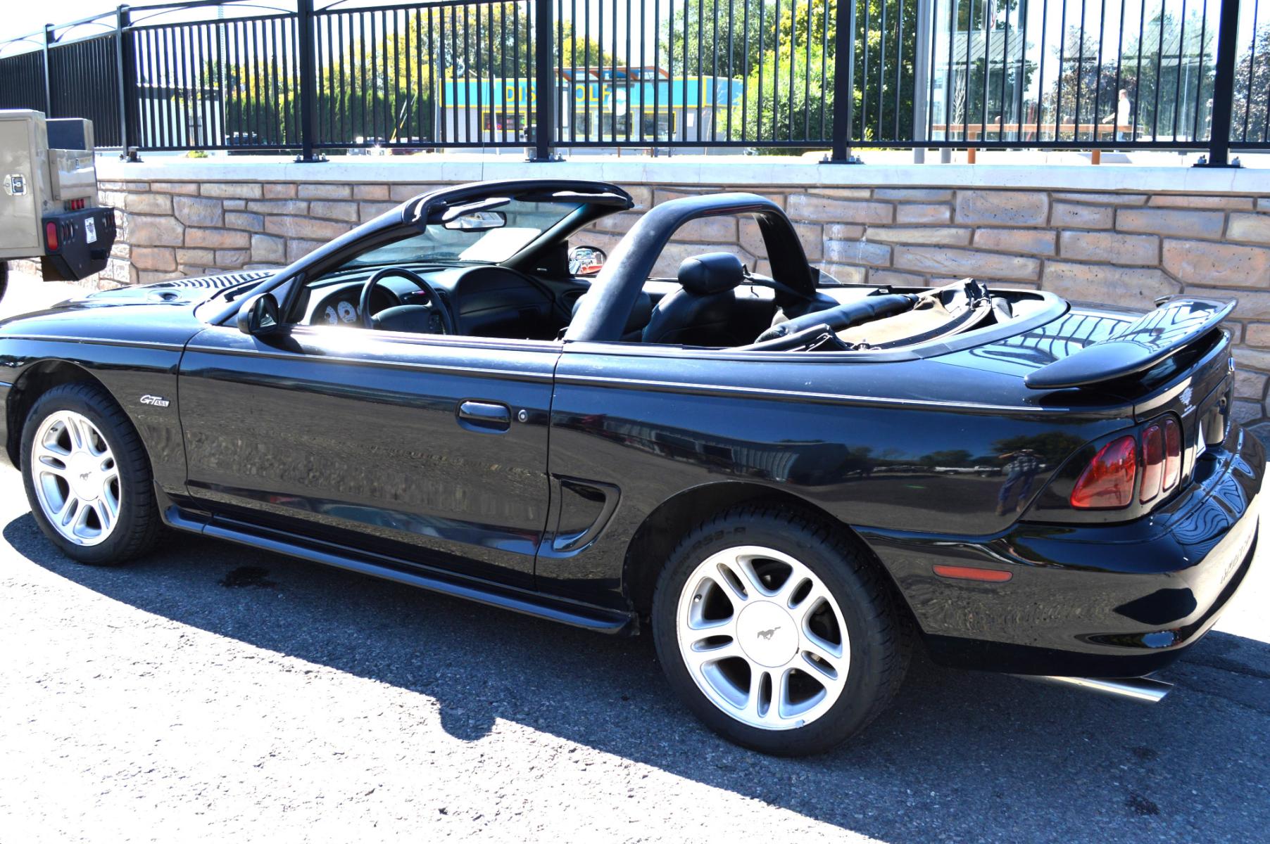 1998 Black Ford Mustang GT Convertible (1FAFP45X0WF) with an 4.6L V8 SOHC 16V engine, Automatic transmission, located at 450 N Russell, Missoula, MT, 59801, (406) 543-6600, 46.874496, -114.017433 - Brand New Convertible Top goes up and down great. Automatic Transmission. Air. Cruise. Tilt. This vehicle is more then 20 years old and is not eligible for lending through our finance companies. - Photo #2