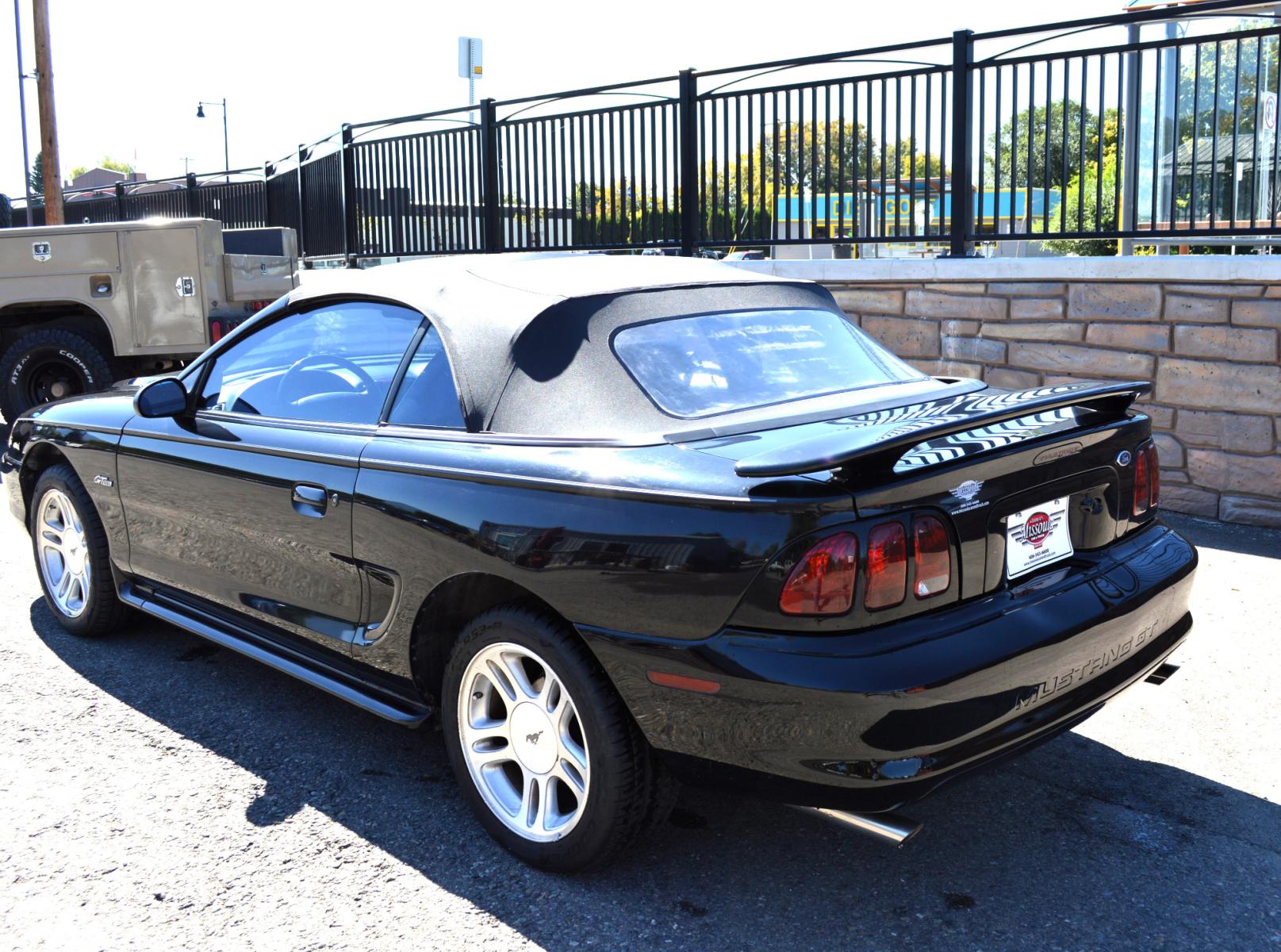 1998 Black Ford Mustang GT Convertible (1FAFP45X0WF) with an 4.6L V8 SOHC 16V engine, Automatic transmission, located at 450 N Russell, Missoula, MT, 59801, (406) 543-6600, 46.874496, -114.017433 - Photo #4