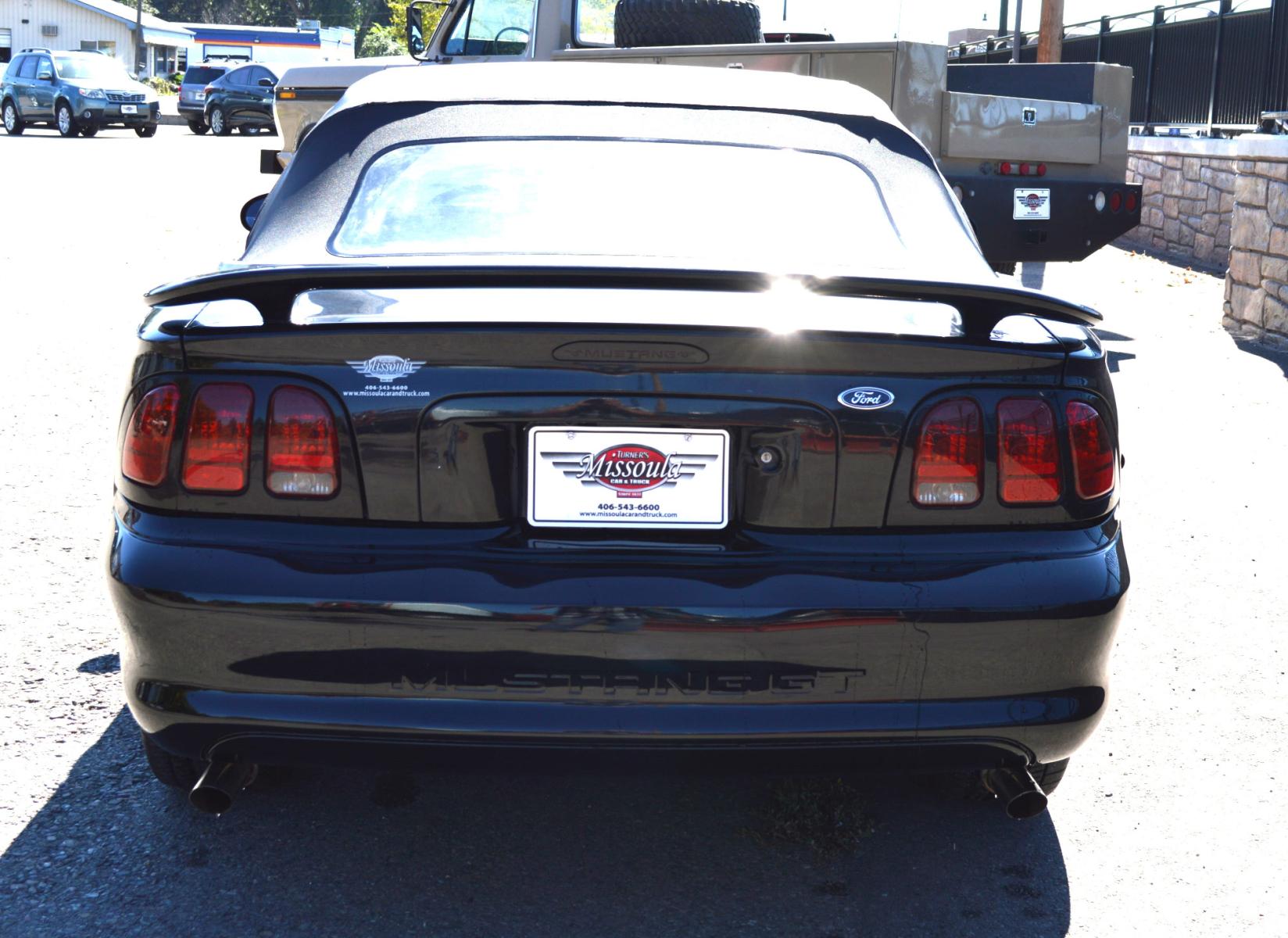 1998 Black Ford Mustang GT Convertible (1FAFP45X0WF) with an 4.6L V8 SOHC 16V engine, Automatic transmission, located at 450 N Russell, Missoula, MT, 59801, (406) 543-6600, 46.874496, -114.017433 - Photo #5