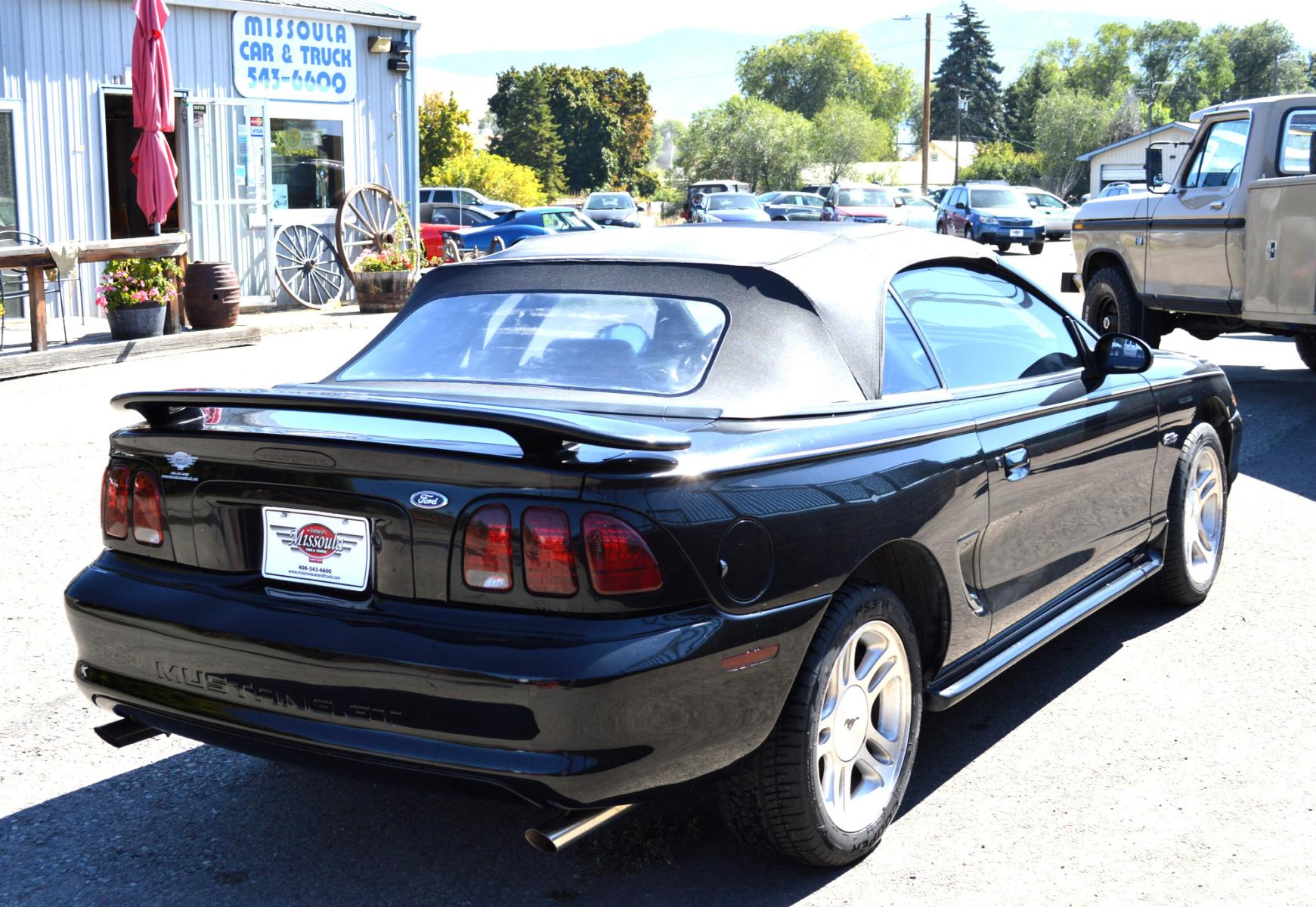 1998 Black Ford Mustang GT Convertible (1FAFP45X0WF) with an 4.6L V8 SOHC 16V engine, Automatic transmission, located at 450 N Russell, Missoula, MT, 59801, (406) 543-6600, 46.874496, -114.017433 - Brand New Convertible Top goes up and down great. Automatic Transmission. Air. Cruise. Tilt. This vehicle is more then 20 years old and is not eligible for lending through our finance companies. - Photo #6
