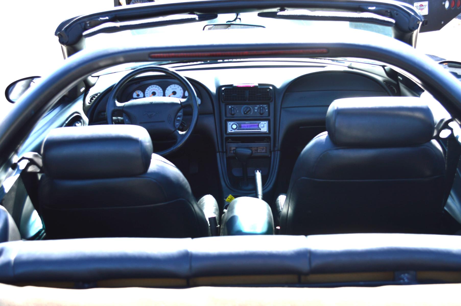 1998 Black Ford Mustang GT Convertible (1FAFP45X0WF) with an 4.6L V8 SOHC 16V engine, Automatic transmission, located at 450 N Russell, Missoula, MT, 59801, (406) 543-6600, 46.874496, -114.017433 - Photo #11