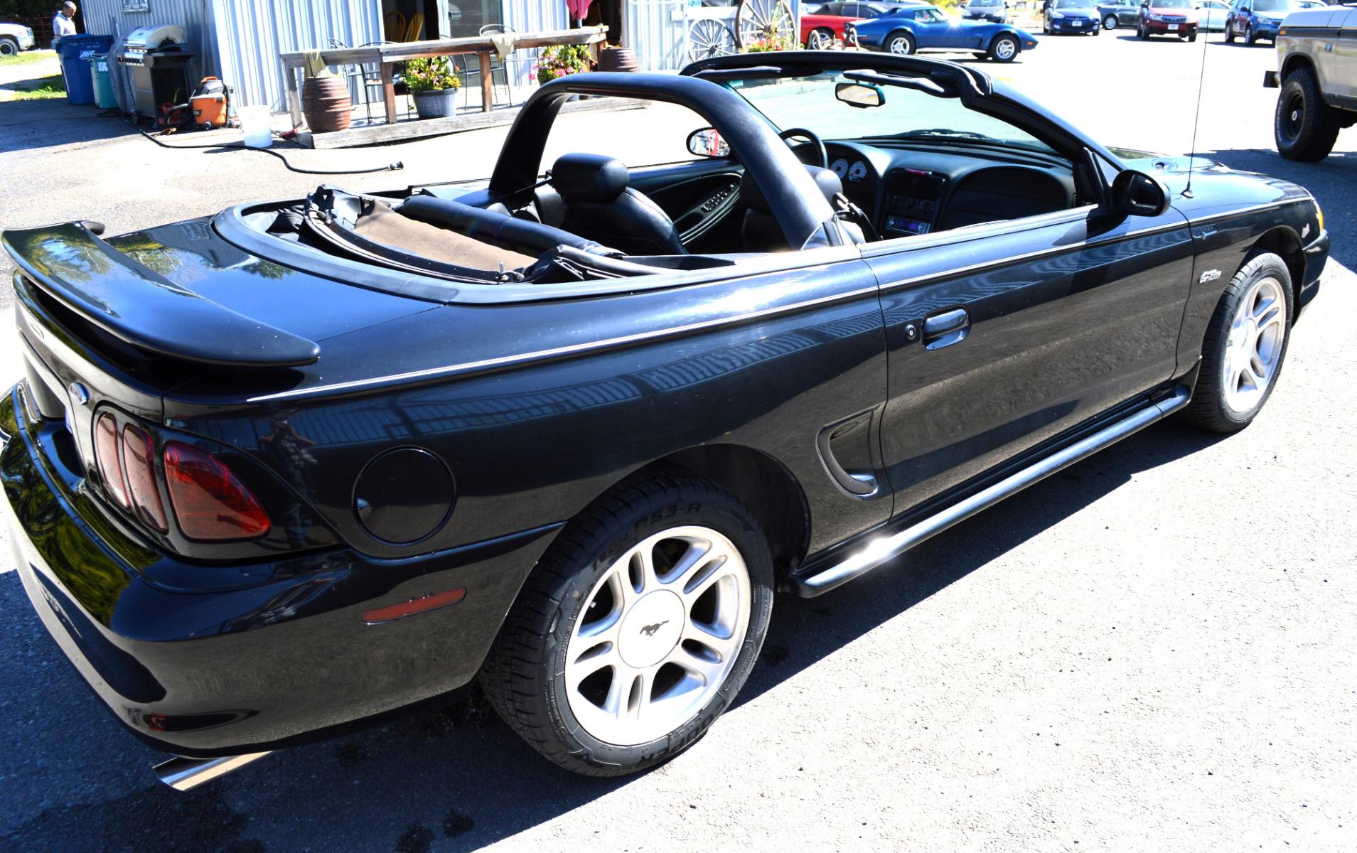 1998 Black Ford Mustang GT Convertible (1FAFP45X0WF) with an 4.6L V8 SOHC 16V engine, Automatic transmission, located at 450 N Russell, Missoula, MT, 59801, (406) 543-6600, 46.874496, -114.017433 - Brand New Convertible Top goes up and down great. Automatic Transmission. Air. Cruise. Tilt. This vehicle is more then 20 years old and is not eligible for lending through our finance companies. - Photo #12