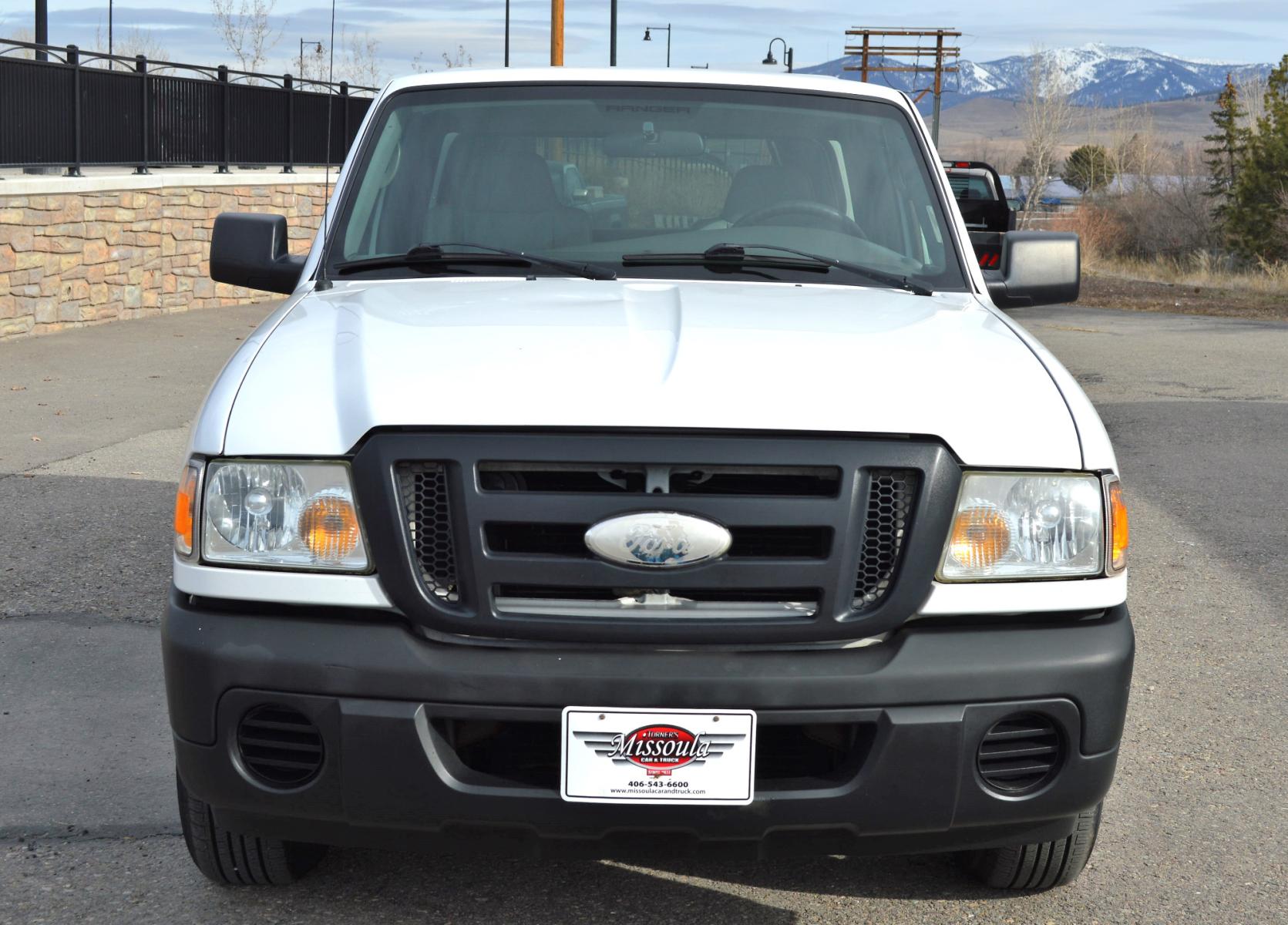 2009 White Ford Ranger Sport 2WD (1FTYR10D79P) with an 2.3L L4 SOHC 8V engine, Automatic transmission, located at 450 N Russell, Missoula, MT, 59801, (406) 543-6600, 46.874496, -114.017433 - Great Running Little Truck with Matching Topper. Automatic Transmission. Air. Cruise. Tilt. - Photo #2