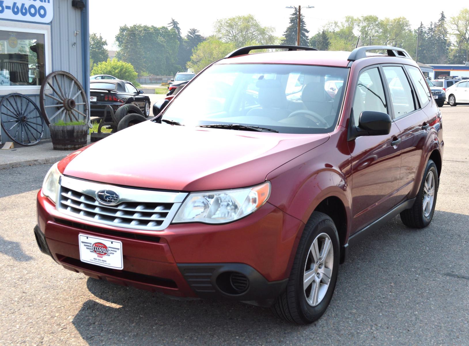 2012 Red Subaru Forester 2.5X (JF2SHABCXCH) with an 2.5L H4 SOHC 16V engine, 4-Speed Automatic transmission, located at 450 N Russell, Missoula, MT, 59801, (406) 543-6600, 46.874496, -114.017433 - Has a Timing Chain not a Belt. Automatic. Air. Cruise. Tilt. - Photo #2