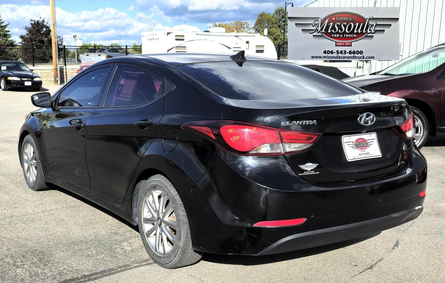 2016 Black Hyundai Elantra Limited (5NPDH4AE9GH) with an 1.8L L4 DOHC 16V engine, 6-Speed Automatic transmission, located at 450 N Russell, Missoula, MT, 59801, (406) 543-6600, 46.874496, -114.017433 - Photo#4