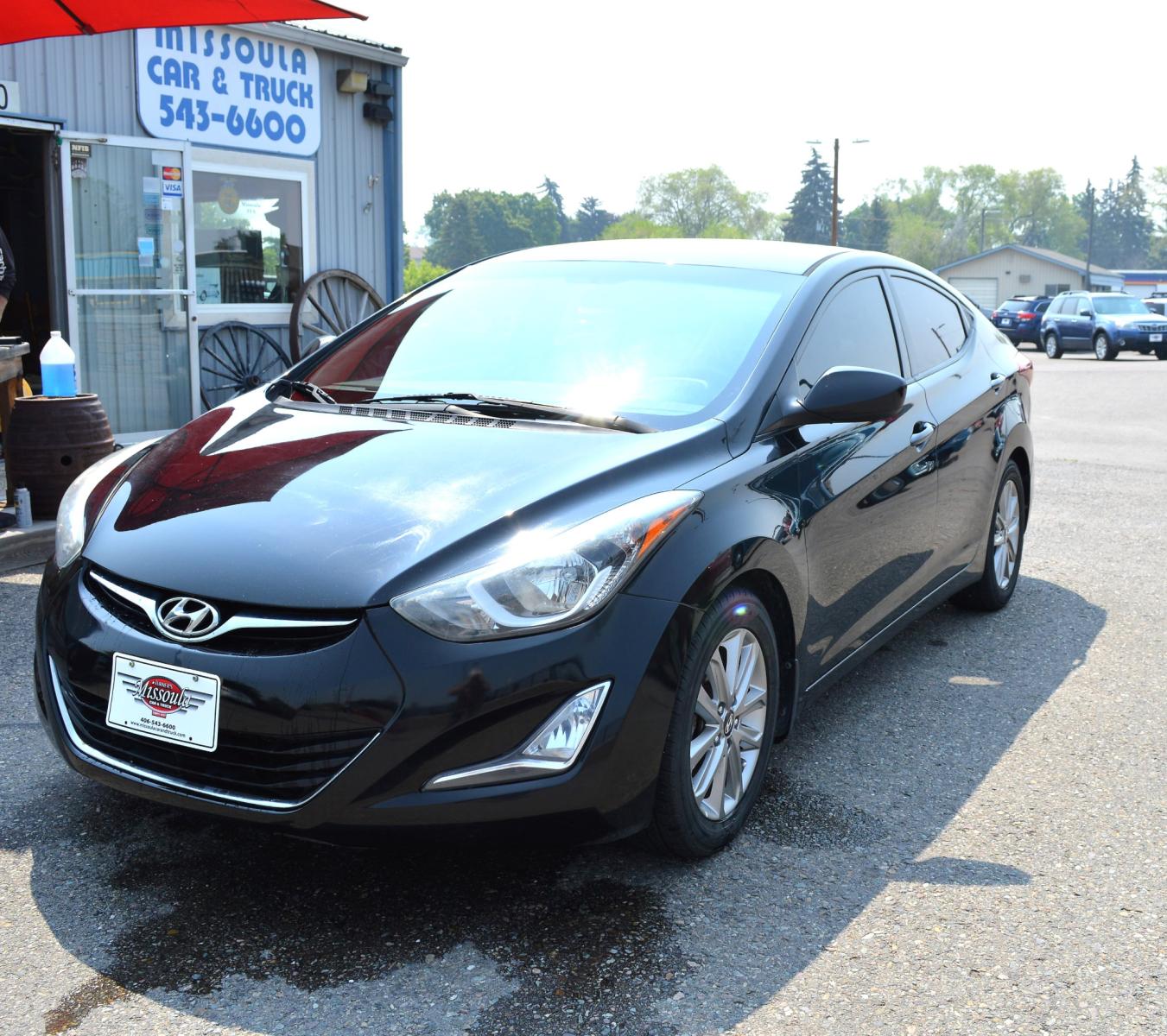 2016 Black Hyundai Elantra Limited (5NPDH4AE9GH) with an 1.8L L4 DOHC 16V engine, 6-Speed Automatic transmission, located at 450 N Russell, Missoula, MT, 59801, (406) 543-6600, 46.874496, -114.017433 - Great Running Sedan. Automatic Transmission. Air. Cruise. Tilt. Backup Camera. Bluetooth. Power Windows and Locks. - Photo #1