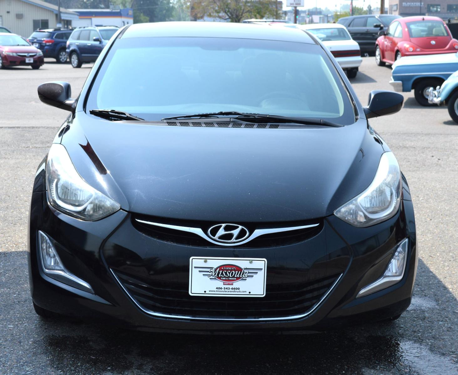 2016 Black Hyundai Elantra Limited (5NPDH4AE9GH) with an 1.8L L4 DOHC 16V engine, 6-Speed Automatic transmission, located at 450 N Russell, Missoula, MT, 59801, (406) 543-6600, 46.874496, -114.017433 - Great Running Sedan. Automatic Transmission. Air. Cruise. Tilt. Backup Camera. Bluetooth. Power Windows and Locks. - Photo #2
