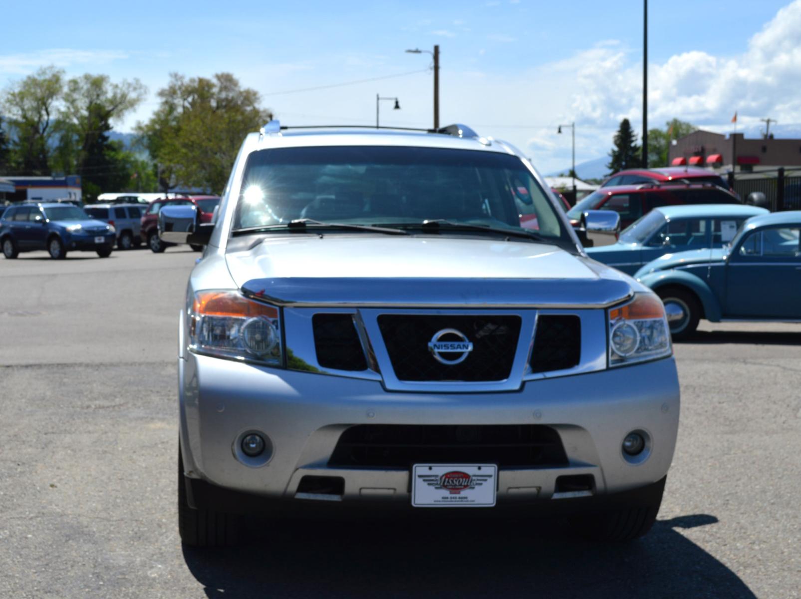 2011 Silver Nissan Armada SL 4WD (5N1AA0NC5BN) with an 5.6L V8 DOHC 32V engine, 5-Speed Automatic transmission, located at 450 N Russell, Missoula, MT, 59801, (406) 543-6600, 46.874496, -114.017433 - Really Nice SUV. 4 Wheel Drive. Power Sunroof. 3rd Row Seating. Rear Entertainment. Leather Heated Seats. Air. Cruise. Tilt. LOADED! - Photo #2