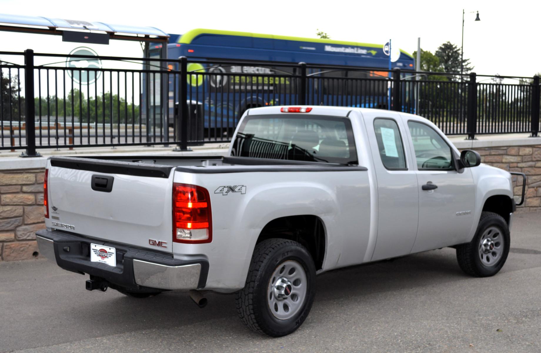 2010 Silver /Black GMC Sierra 1500 Work Truck Ext. Cab 4WD (1GTSKTE38AZ) with an 5.3L V8 OHV 16V FFV engine, 4-Speed Automatic transmission, located at 450 N Russell, Missoula, MT, 59801, (406) 543-6600, 46.874496, -114.017433 - Runs Great! 4 Wheel Drive. Extra Cab. Automatic Transmission. Air conditioning. Cruise Control. Power Windows. Towing Package. - Photo #2