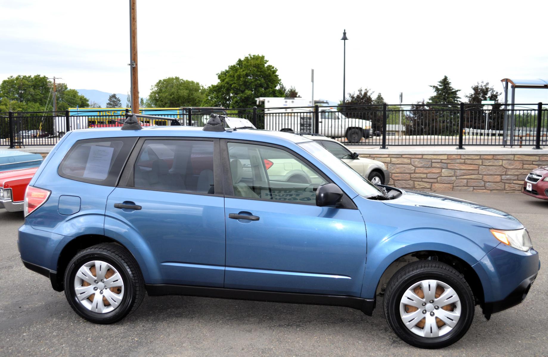 2009 Blue Subaru Forester 2.5X (JF2SH61629H) with an 2.5L H4 SOHC 16V engine, 4-Speed Automatic Overdrive transmission, located at 450 N Russell, Missoula, MT, 59801, (406) 543-6600, 46.874496, -114.017433 - Nice Suby. New Timing and Head Gasket. Automatic Transmission. Air. Cruise, Tilt. Power Windows and Locks. - Photo #9