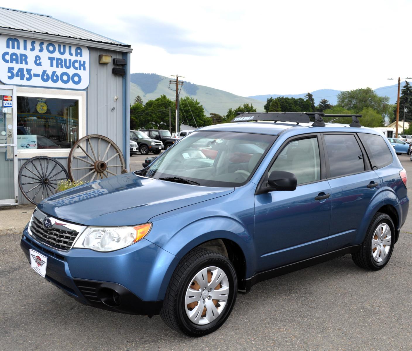 2009 Blue Subaru Forester 2.5X (JF2SH61629H) with an 2.5L H4 SOHC 16V engine, 4-Speed Automatic Overdrive transmission, located at 450 N Russell, Missoula, MT, 59801, (406) 543-6600, 46.874496, -114.017433 - Nice Suby. New Timing and Head Gasket. Automatic Transmission. Air. Cruise, Tilt. Power Windows and Locks. - Photo #1