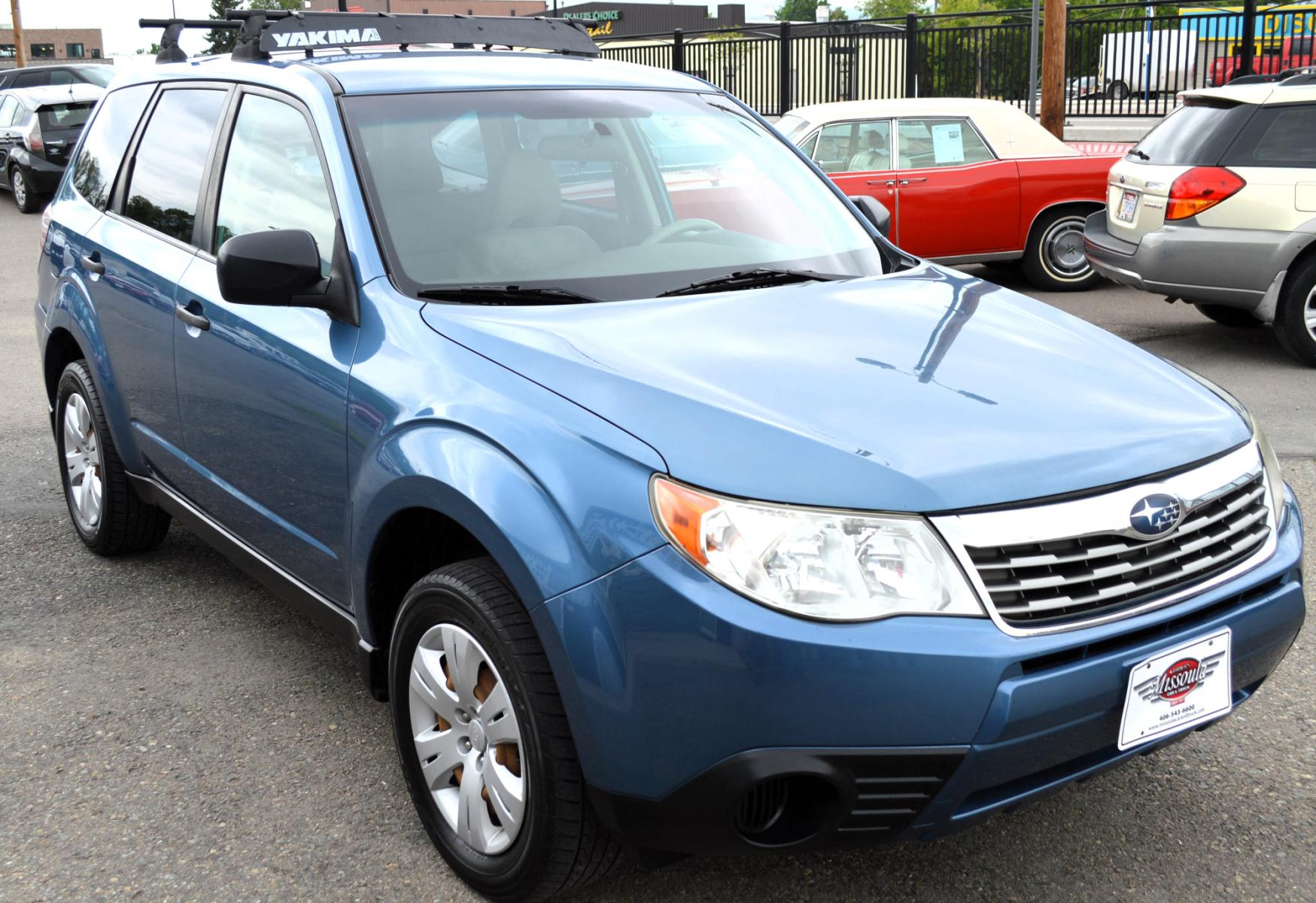 2009 Blue Subaru Forester 2.5X (JF2SH61629H) with an 2.5L H4 SOHC 16V engine, 4-Speed Automatic Overdrive transmission, located at 450 N Russell, Missoula, MT, 59801, (406) 543-6600, 46.874496, -114.017433 - Nice Suby. New Timing and Head Gasket. Automatic Transmission. Air. Cruise, Tilt. Power Windows and Locks. - Photo #8
