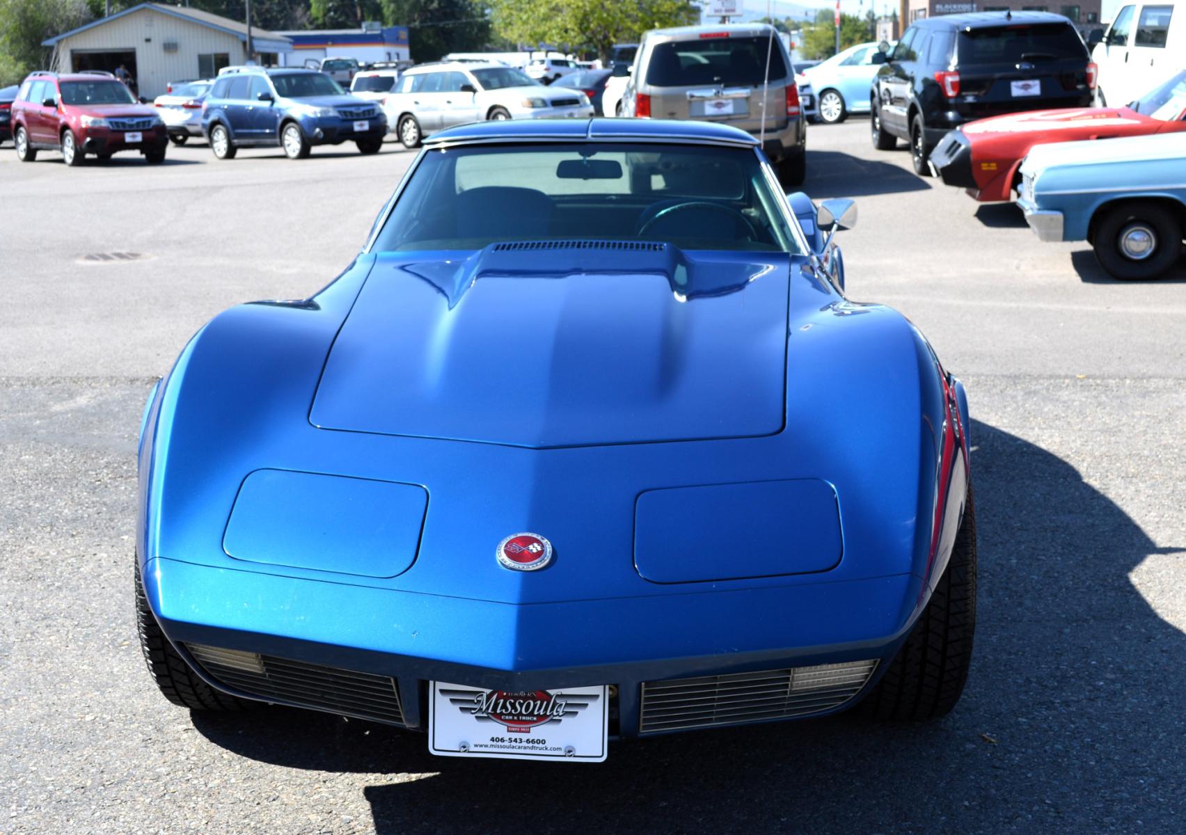 1973 Blue /Black Chevrolet Corvette Stingray (1Z37J3S4290) with an 350 engine, 4-Speed Manual transmission, located at 450 N Russell, Missoula, MT, 59801, (406) 543-6600, 46.874496, -114.017433 - Classy Looking Vette. Beautiful Blue. 4 Speed Manual Transmission. 350 Engine This vehicle is more then 20 years old and is not eligible for lending through our finance companies. - Photo #3