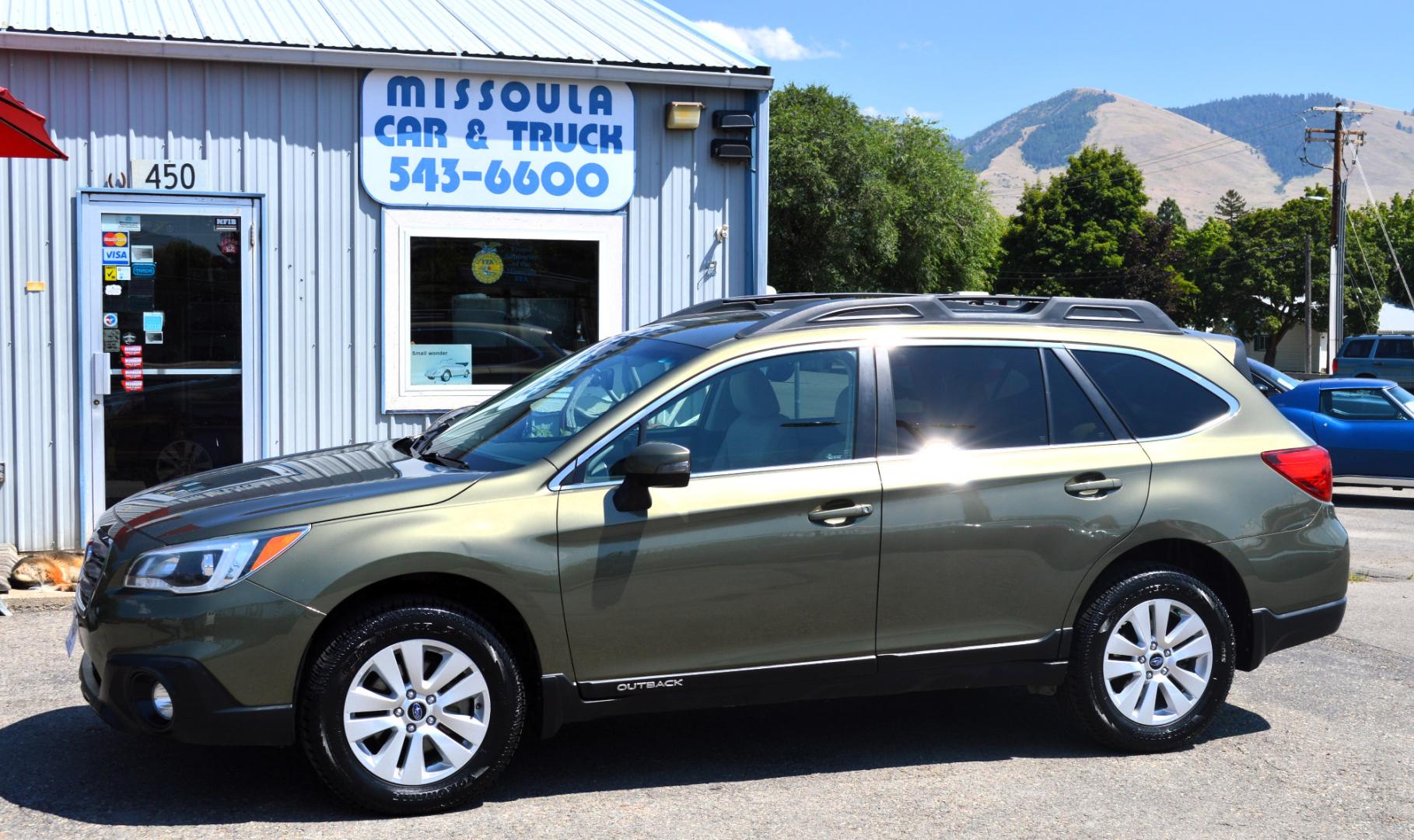 2015 Green /White Subaru Outback 2.5i Premium (4S4BSAFC5F3) with an 2.5L H4 DOHC 16V engine, 6-Speed Automatic transmission, located at 450 N Russell, Missoula, MT, 59801, (406) 543-6600, 46.874496, -114.017433 - Beautiful Green Outback. All Wheel Drive.Automatic Transmission. Heated Seats. Air. Cruise. Tilt. AM FM CD Sat. Bluetooth. Backup Camera. - Photo#0