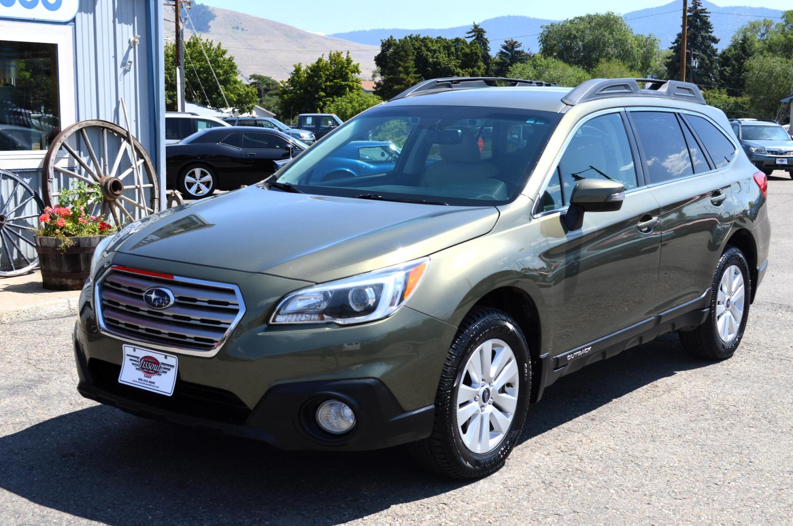 2015 Green /White Subaru Outback 2.5i Premium (4S4BSAFC5F3) with an 2.5L H4 DOHC 16V engine, 6-Speed Automatic transmission, located at 450 N Russell, Missoula, MT, 59801, (406) 543-6600, 46.874496, -114.017433 - Beautiful Green Outback. All Wheel Drive.Automatic Transmission. Heated Seats. Air. Cruise. Tilt. AM FM CD Sat. Bluetooth. Backup Camera. - Photo#1