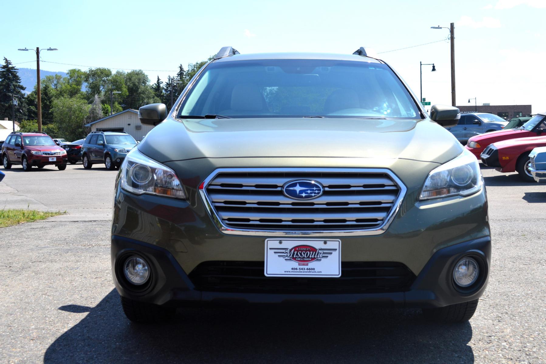 2015 Green /White Subaru Outback 2.5i Premium (4S4BSAFC5F3) with an 2.5L H4 DOHC 16V engine, 6-Speed Automatic transmission, located at 450 N Russell, Missoula, MT, 59801, (406) 543-6600, 46.874496, -114.017433 - Beautiful Green Outback. All Wheel Drive.Automatic Transmission. Heated Seats. Air. Cruise. Tilt. AM FM CD Sat. Bluetooth. Backup Camera. - Photo #2