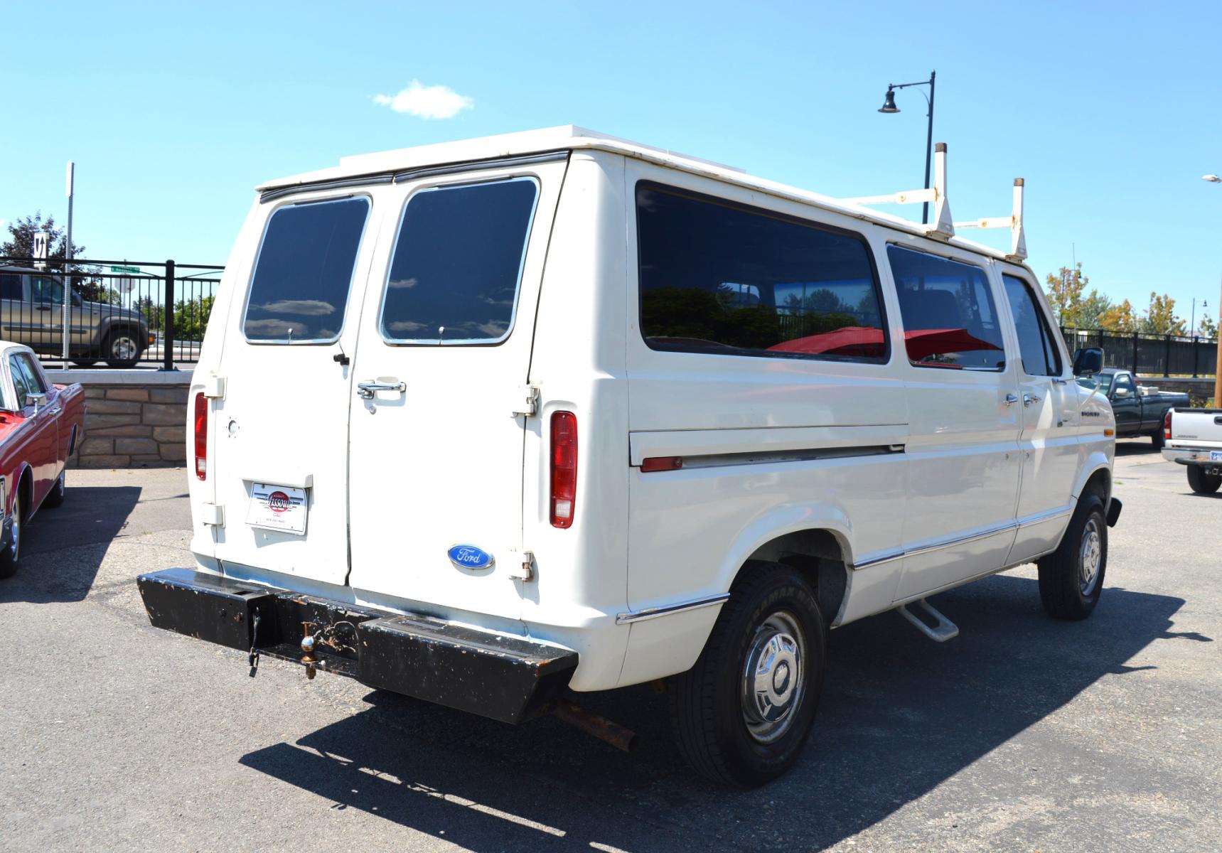 1990 White /Black Ford Econoline E250 (1FTFE24H6LH) with an 5.8L V8 OHV 16V engine, 4-Speed Automatic Overdrive transmission, located at 450 N Russell, Missoula, MT, 59801, (406) 543-6600, 46.874496, -114.017433 - Converted 3/4 Ton Ford Van. Has solar panels on top with a converter for power inside. Had a fold out bed. Comes with a sink that you hook to a 5 gallon water jug. Runs great. This vehicle is more then 20 years old and is not eligible for lending through our finance companies. - Photo #5