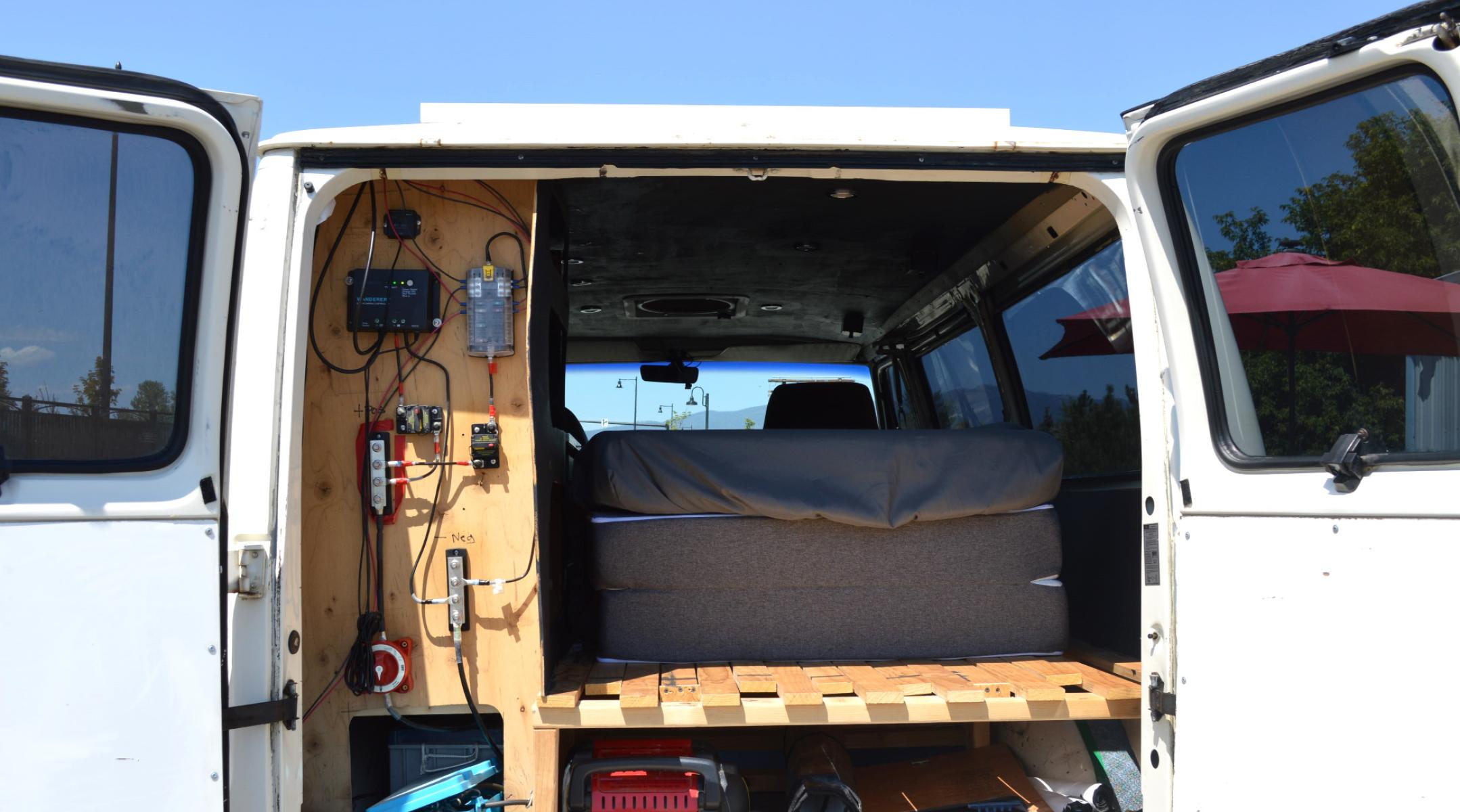 1990 White /Black Ford Econoline E250 (1FTFE24H6LH) with an 5.8L V8 OHV 16V engine, 4-Speed Automatic Overdrive transmission, located at 450 N Russell, Missoula, MT, 59801, (406) 543-6600, 46.874496, -114.017433 - Converted 3/4 Ton Ford Van. Has solar panels on top with a converter for power inside. Had a fold out bed. Comes with a sink that you hook to a 5 gallon water jug. Runs great. This vehicle is more then 20 years old and is not eligible for lending through our finance companies. - Photo #8