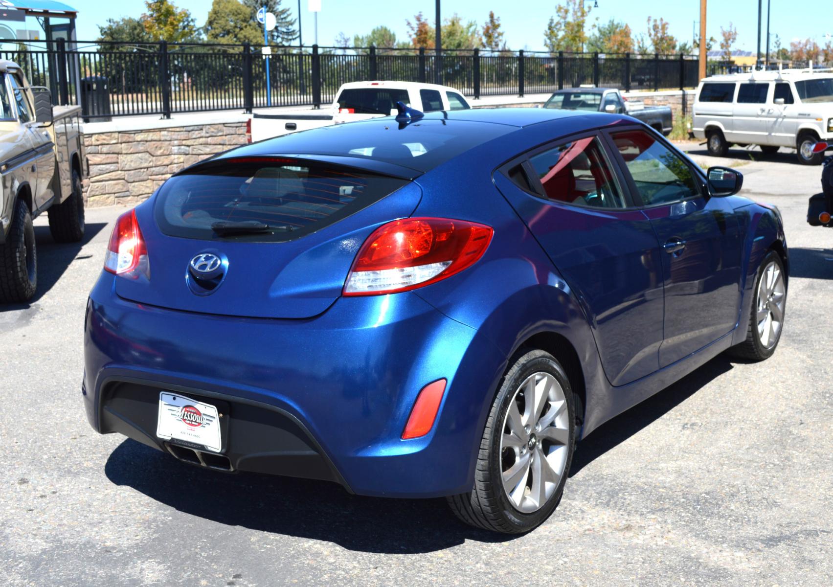 2017 Blue /Black Hyundai Veloster Base 6MT (KMHTC6AD2HU) with an 1.6L L4 DOHC 16V engine, 6M Automatic transmission, located at 450 N Russell, Missoula, MT, 59801, (406) 543-6600, 46.874496, -114.017433 - Cute Little Coupe. 3 Doors. Automatic Transmission. Air. Cruise. Tilt. Power Windows and Locks. Bluetooth. Backup Camera. - Photo #5
