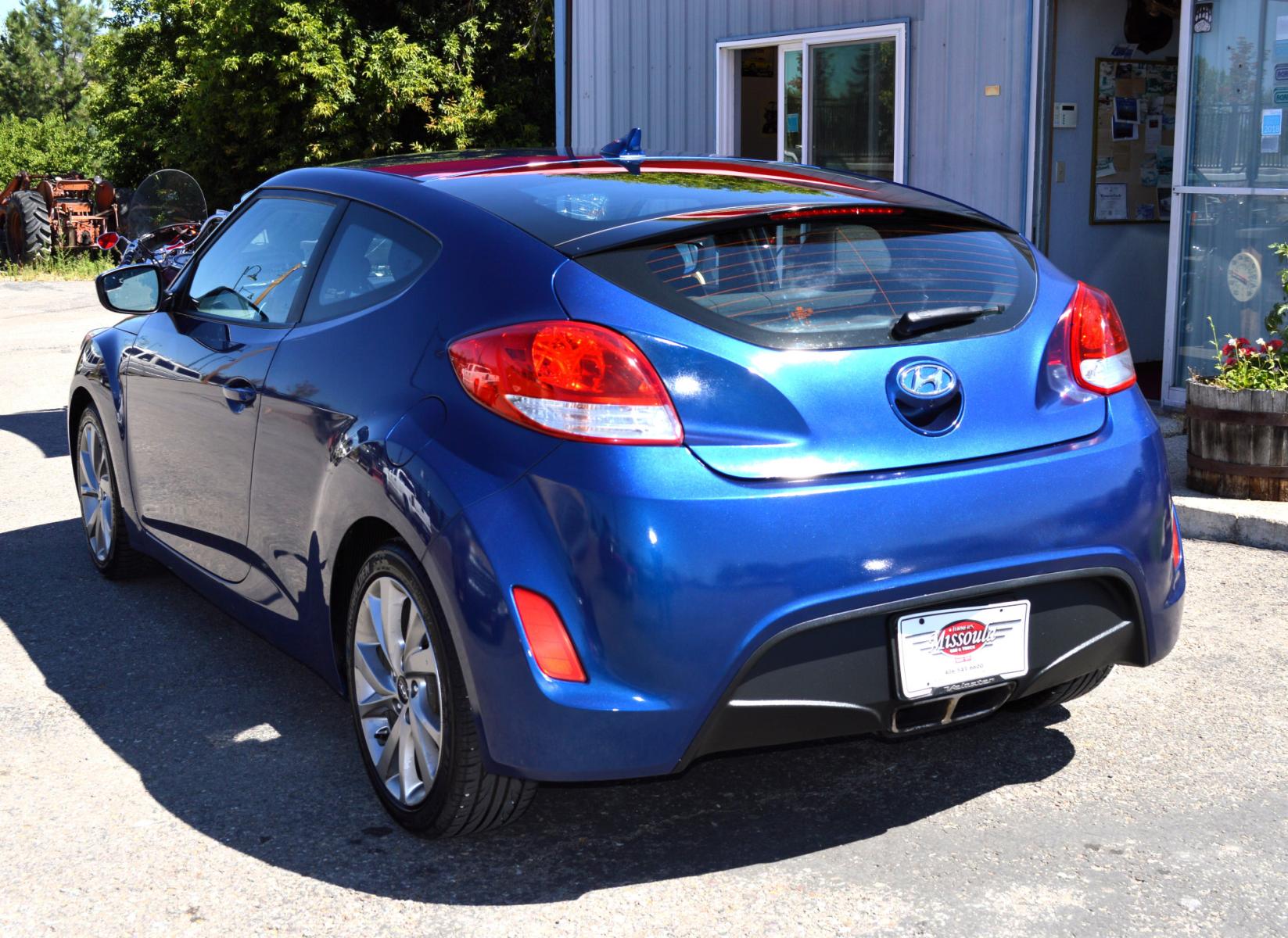 2017 Blue /Black Hyundai Veloster Base 6MT (KMHTC6AD2HU) with an 1.6L L4 DOHC 16V engine, 6M Automatic transmission, located at 450 N Russell, Missoula, MT, 59801, (406) 543-6600, 46.874496, -114.017433 - Cute Little Coupe. 3 Doors. Automatic Transmission. Air. Cruise. Tilt. Power Windows and Locks. Bluetooth. Backup Camera. - Photo #6