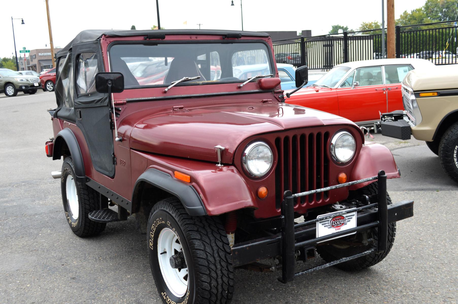 1969 Maroon Jeep CJ5 (83050173554) with an 235 6 Cylinder engine, 3 Speed Manual transmission, located at 450 N Russell, Missoula, MT, 59801, (406) 543-6600, 46.874496, -114.017433 - Cute little Jeep. 4 Wheel drive Works Great. 3 Speed Manual Transmission. Rear Bench Seat. Comes with Soft Top. No Hard Top. Does come with a Nice cover as well. This vehicle is more then 20 years old and is not eligible for lending through our finance companies. - Photo #3