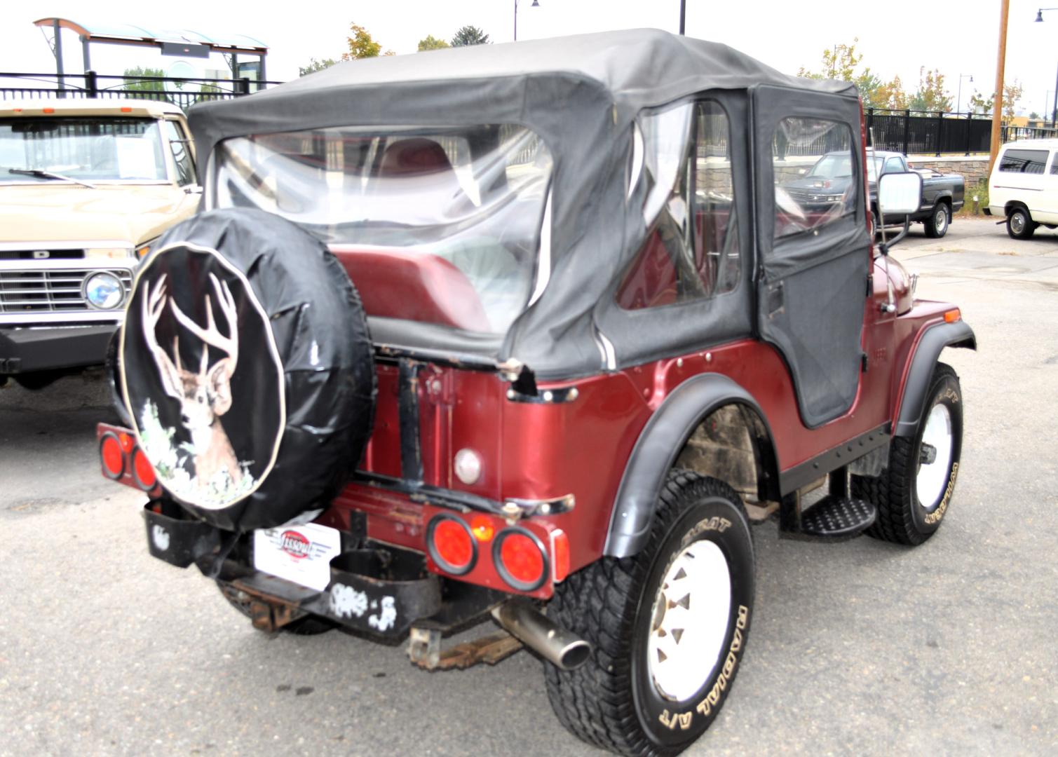 1969 Maroon Jeep CJ5 (83050173554) with an 235 6 Cylinder engine, 3 Speed Manual transmission, located at 450 N Russell, Missoula, MT, 59801, (406) 543-6600, 46.874496, -114.017433 - Cute little Jeep. 4 Wheel drive Works Great. 3 Speed Manual Transmission. Rear Bench Seat. Comes with Soft Top. No Hard Top. Does come with a Nice cover as well. This vehicle is more then 20 years old and is not eligible for lending through our finance companies. - Photo#6