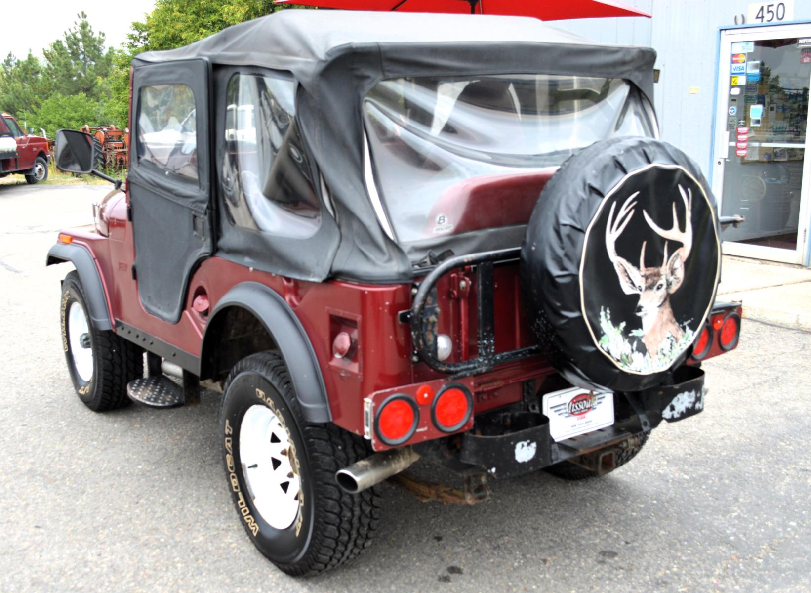 1969 Maroon Jeep CJ5 (83050173554) with an 235 6 Cylinder engine, 3 Speed Manual transmission, located at 450 N Russell, Missoula, MT, 59801, (406) 543-6600, 46.874496, -114.017433 - Cute little Jeep. 4 Wheel drive Works Great. 3 Speed Manual Transmission. Rear Bench Seat. Comes with Soft Top. No Hard Top. Does come with a Nice cover as well. This vehicle is more then 20 years old and is not eligible for lending through our finance companies. - Photo #7