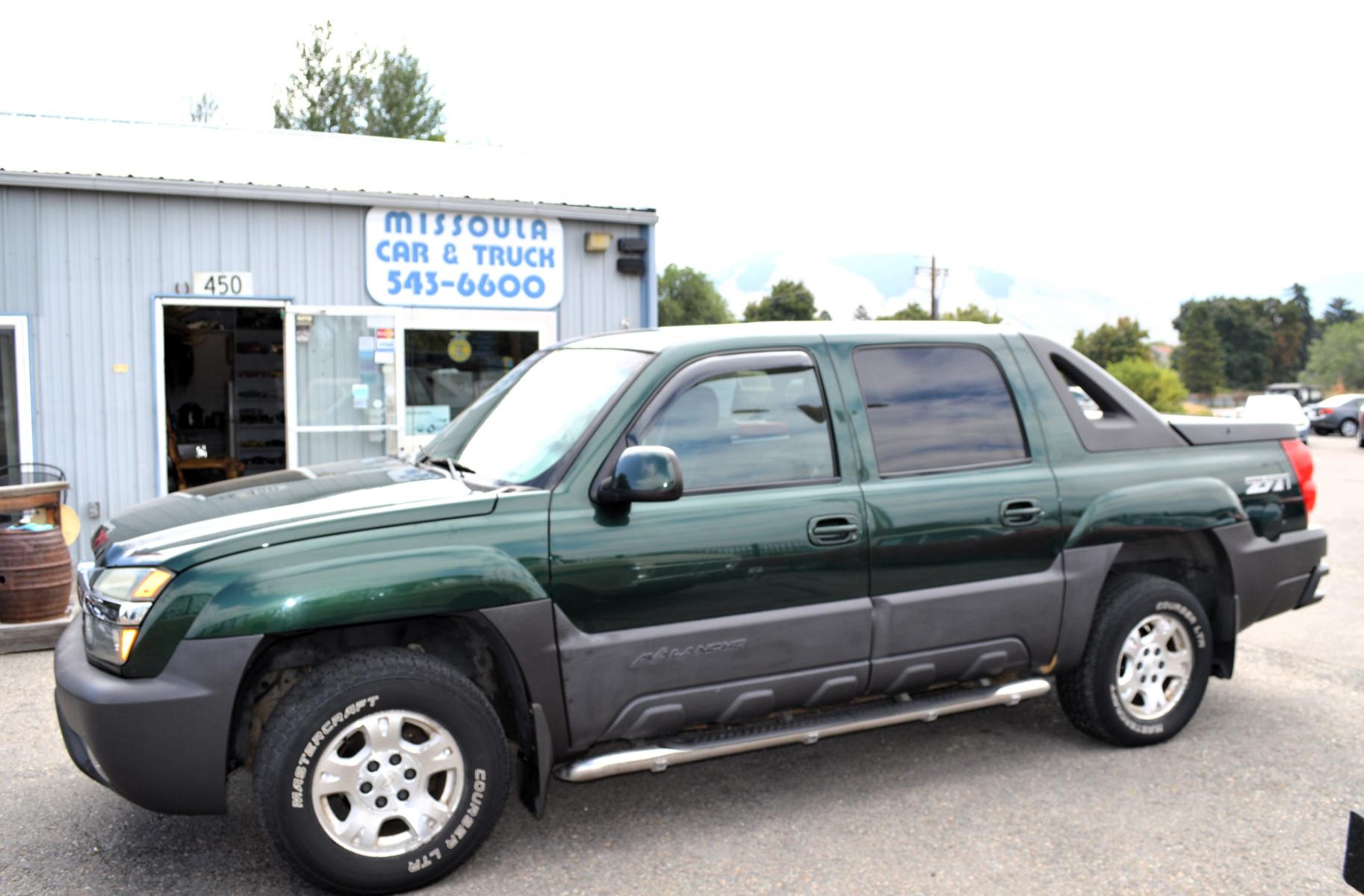 2003 Green Chevrolet Avalanche 1500 4WD (3GNEK13T83G) with an 5.3L V8 OHV 16V engine, 4-Speed Automatic Overdrive transmission, located at 450 N Russell, Missoula, MT, 59801, (406) 543-6600, 46.874496, -114.017433 - Barely over 100K Miles. Runs well. Good condition overall. Automatic Transmission. Air. Cruise. Tilt. AM FM CD Player. This vehicle is more then 20 years old and is not eligible for lending through our finance companies. - Photo #0