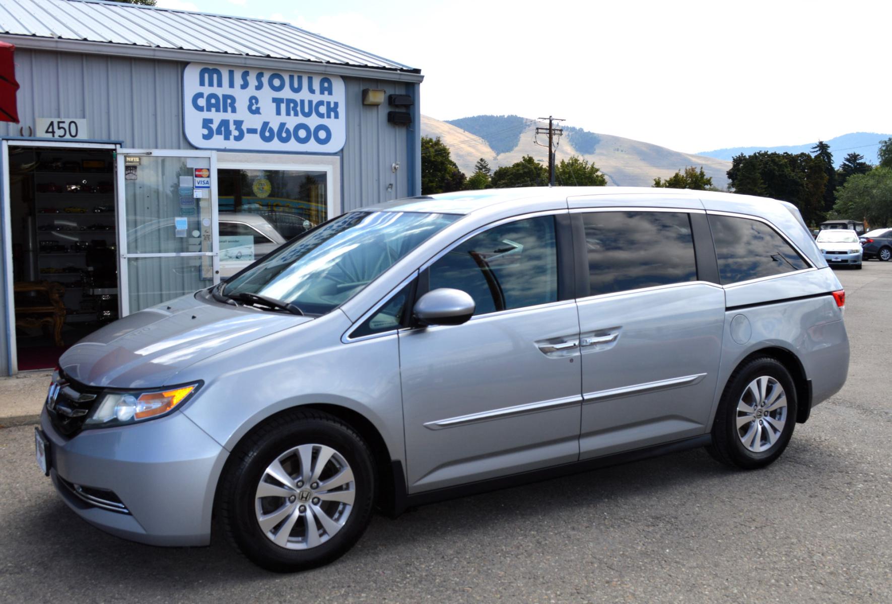 2016 Silver Honda Odyssey EX-L (5FNRL5H6XGB) with an 3.5L V6 SOHC 24V engine, 6A transmission, located at 450 N Russell, Missoula, MT, 59801, (406) 543-6600, 46.874496, -114.017433 - Beautiful Van. 6 Speed Automatic Transmission. Power Sunroof. 3rd Row Seating. Power Sliding Side Doors. Air. Cruise. Tilt. Power Leather Seats. Stow and Go Rear Seats. - Photo #0