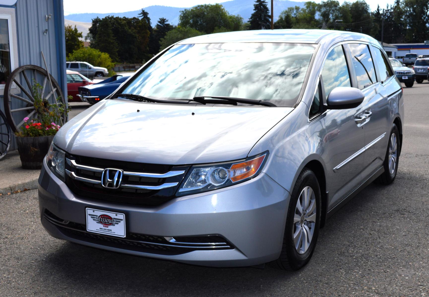 2016 Silver Honda Odyssey EX-L (5FNRL5H6XGB) with an 3.5L V6 SOHC 24V engine, 6A transmission, located at 450 N Russell, Missoula, MT, 59801, (406) 543-6600, 46.874496, -114.017433 - Beautiful Van. 6 Speed Automatic Transmission. Power Sunroof. 3rd Row Seating. Power Sliding Side Doors. Air. Cruise. Tilt. Power Leather Seats. Stow and Go Rear Seats. - Photo #1