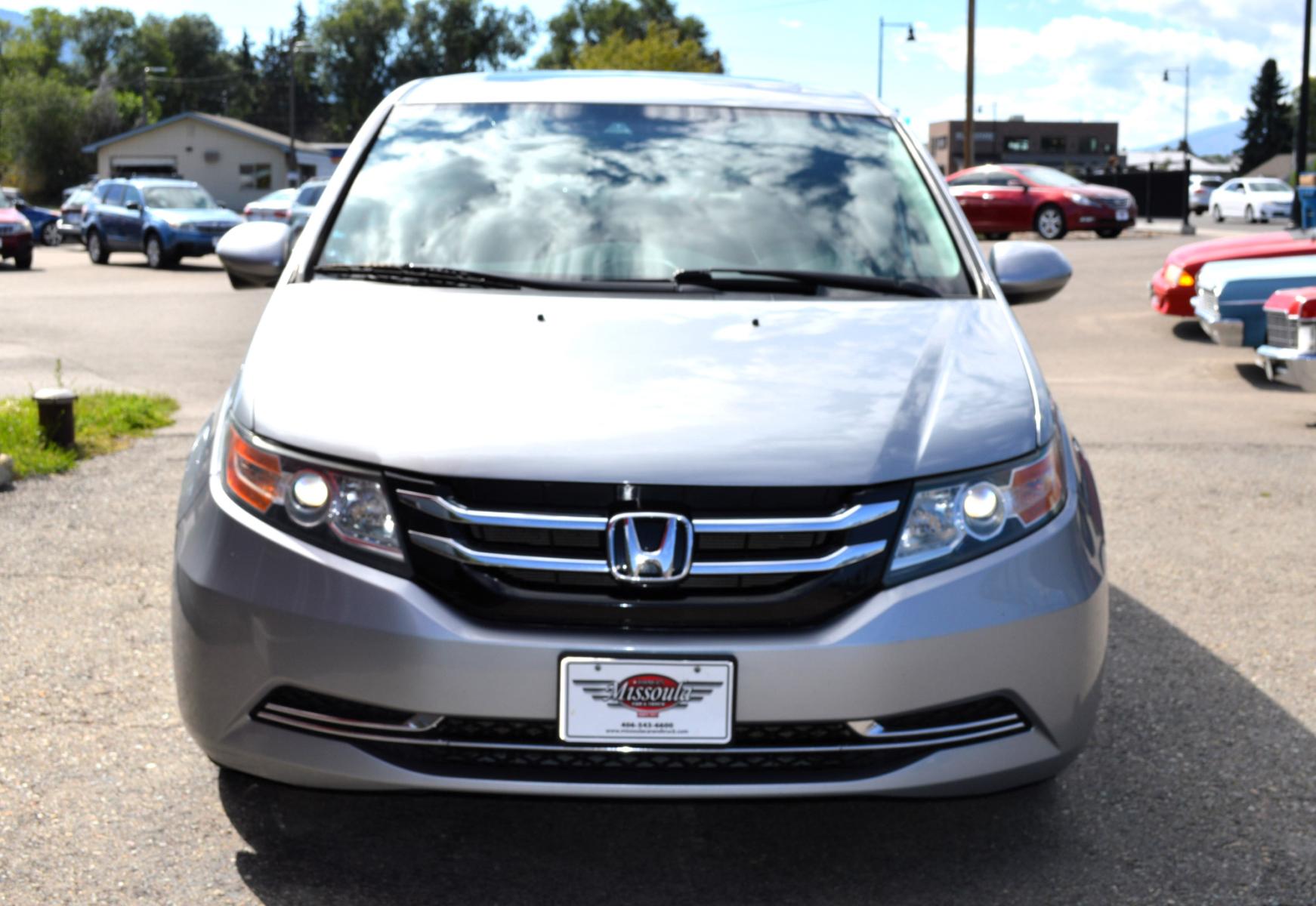 2016 Silver Honda Odyssey EX-L (5FNRL5H6XGB) with an 3.5L V6 SOHC 24V engine, 6A transmission, located at 450 N Russell, Missoula, MT, 59801, (406) 543-6600, 46.874496, -114.017433 - Beautiful Van. 6 Speed Automatic Transmission. Power Sunroof. 3rd Row Seating. Power Sliding Side Doors. Air. Cruise. Tilt. Power Leather Seats. Stow and Go Rear Seats. - Photo #3
