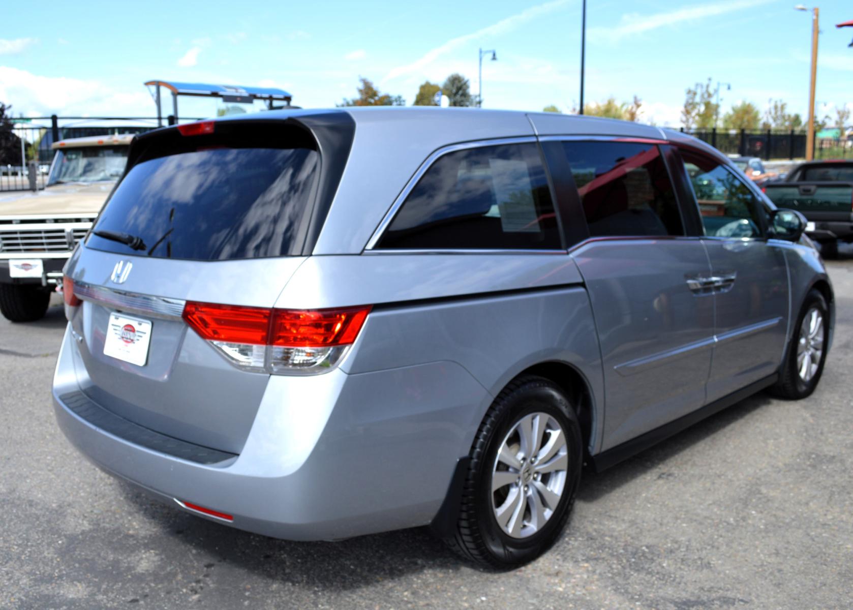 2016 Silver Honda Odyssey EX-L (5FNRL5H6XGB) with an 3.5L V6 SOHC 24V engine, 6A transmission, located at 450 N Russell, Missoula, MT, 59801, (406) 543-6600, 46.874496, -114.017433 - Beautiful Van. 6 Speed Automatic Transmission. Power Sunroof. 3rd Row Seating. Power Sliding Side Doors. Air. Cruise. Tilt. Power Leather Seats. Stow and Go Rear Seats. - Photo #5