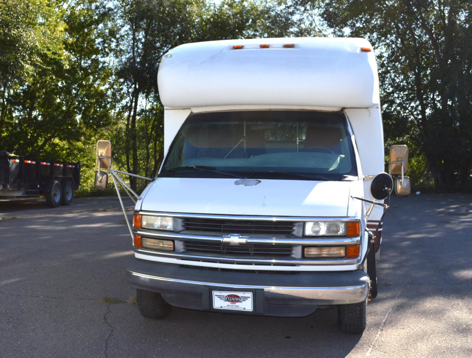 1998 White Chevrolet Express G3500 (1GBJG31J4W1) with an 7.4L V8 OHV 16V engine, 4-Speed Automatic Overdrive transmission, located at 450 N Russell, Missoula, MT, 59801, (406) 543-6600, 46.874496, -114.017433 - Great running Handi-Cap Mini Bus on Chevy 1 Ton Dually. Hydraulic Wheel Chair Lift. Rear Seats fold up out of the way for more room. Front and Rear Air Conditioning. This vehicle is more then 20 years old and is not eligible for lending through our finance companies. - Photo #7