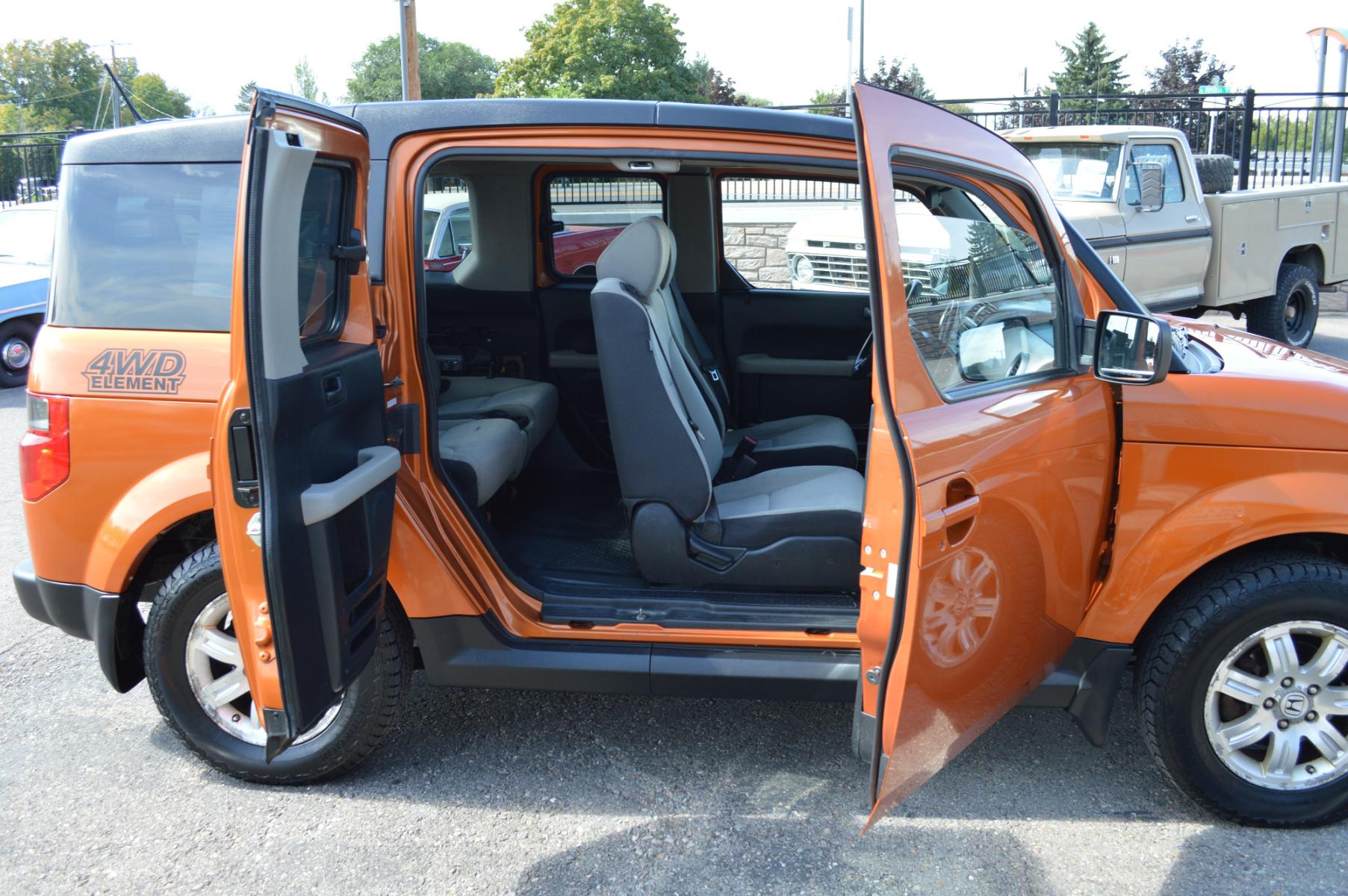 2008 Orange /Black Honda Element EX 4WD AT (5J6YH28728L) with an 2.4L L4 DOHC 16V engine, 5-Speed Automatic Overdrive transmission, located at 450 N Russell, Missoula, MT, 59801, (406) 543-6600, 46.874496, -114.017433 - Cute Element in Excellent Condition. Automatic Transmission. Sunroof. Air. Cruise. Tilt. Power Windows and Locks. AM FM CD XM. Lots of space. - Photo #12