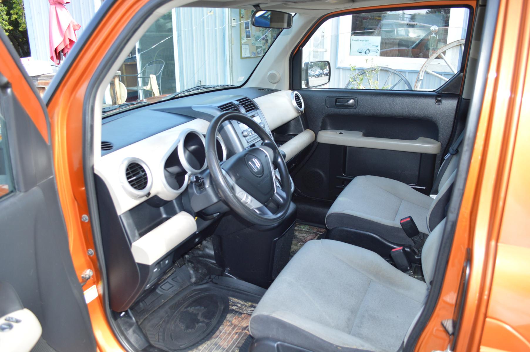 2008 Orange /Black Honda Element EX 4WD AT (5J6YH28728L) with an 2.4L L4 DOHC 16V engine, 5-Speed Automatic Overdrive transmission, located at 450 N Russell, Missoula, MT, 59801, (406) 543-6600, 46.874496, -114.017433 - Cute Element in Excellent Condition. Automatic Transmission. Sunroof. Air. Cruise. Tilt. Power Windows and Locks. AM FM CD XM. Lots of space. - Photo #13