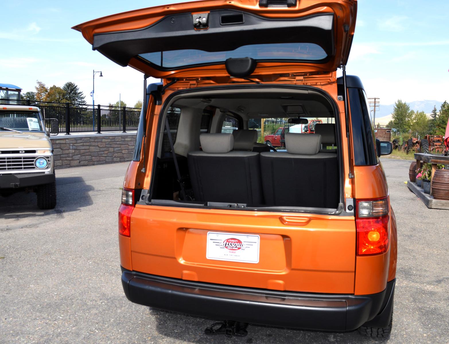 2008 Orange /Black Honda Element EX 4WD AT (5J6YH28728L) with an 2.4L L4 DOHC 16V engine, 5-Speed Automatic Overdrive transmission, located at 450 N Russell, Missoula, MT, 59801, (406) 543-6600, 46.874496, -114.017433 - Cute Element in Excellent Condition. Automatic Transmission. Sunroof. Air. Cruise. Tilt. Power Windows and Locks. AM FM CD XM. Lots of space. - Photo #7