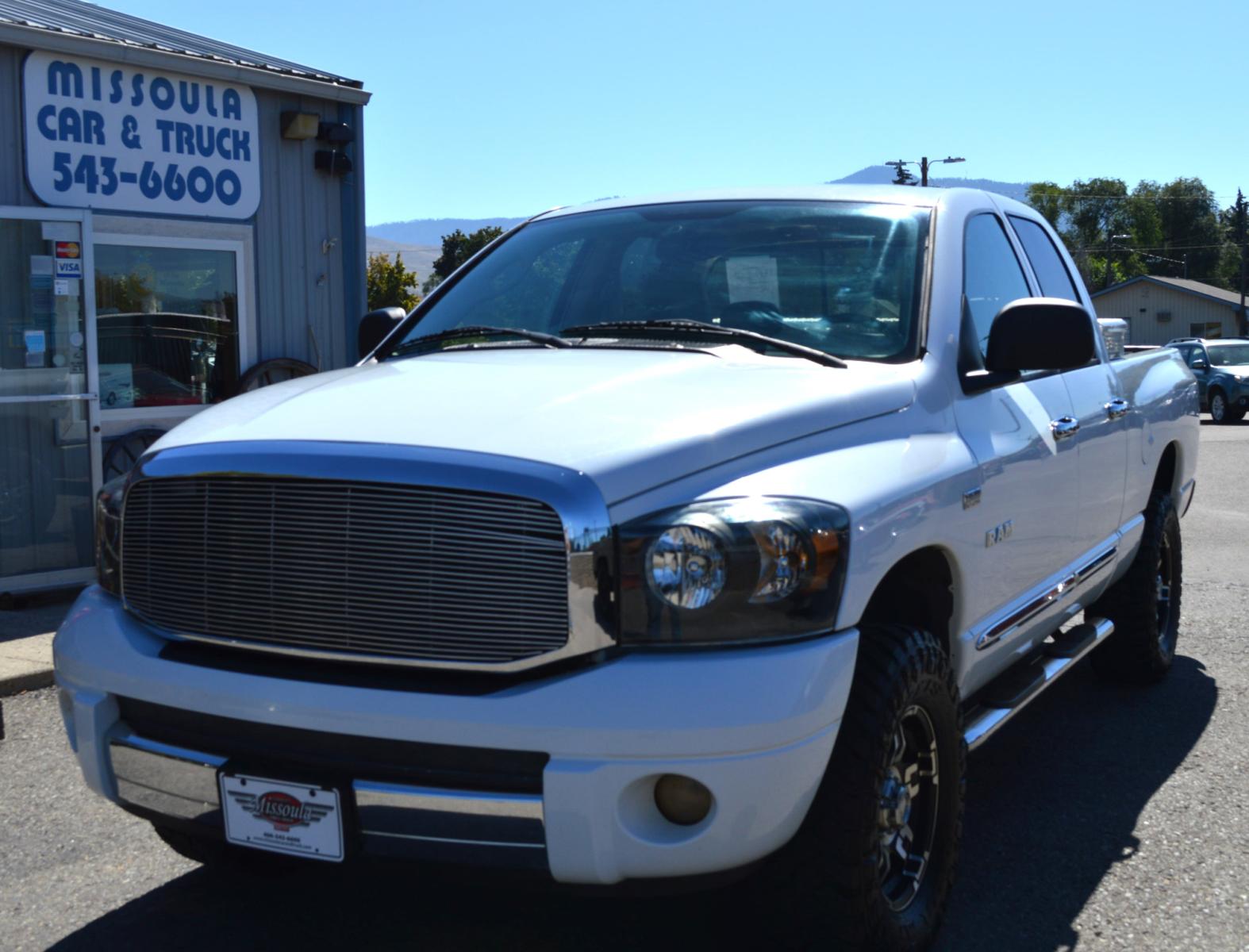 2008 White Dodge Ram 1500 Laramie Quad Cab 4WD (1D7HU18208S) with an 5.7L V8 OHV 16V engine, 5-Speed Automatic Overdrive transmission, located at 450 N Russell, Missoula, MT, 59801, (406) 543-6600, 46.874496, -114.017433 - Clean Truck with Nice Wheels and Tires. 5 Speed Automatic Transmission. Power Sunroof. Heated Power Seats. Premium sound. 6 CD Changer. Air. Cruise. Tilt. Power Windows and Locks. Running Boards.Towing. Tool Box. - Photo #1