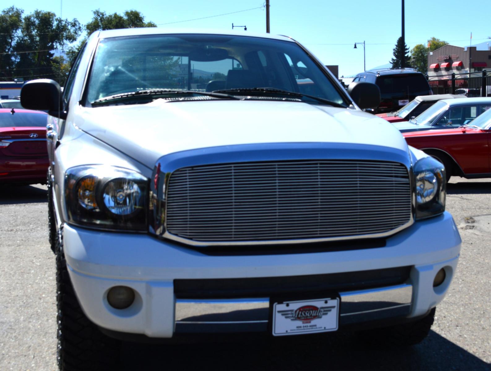 2008 White Dodge Ram 1500 Laramie Quad Cab 4WD (1D7HU18208S) with an 5.7L V8 OHV 16V engine, 5-Speed Automatic Overdrive transmission, located at 450 N Russell, Missoula, MT, 59801, (406) 543-6600, 46.874496, -114.017433 - Clean Truck with Nice Wheels and Tires. 5 Speed Automatic Transmission. Power Sunroof. Heated Power Seats. Premium sound. 6 CD Changer. Air. Cruise. Tilt. Power Windows and Locks. Running Boards.Towing. Tool Box. - Photo #2