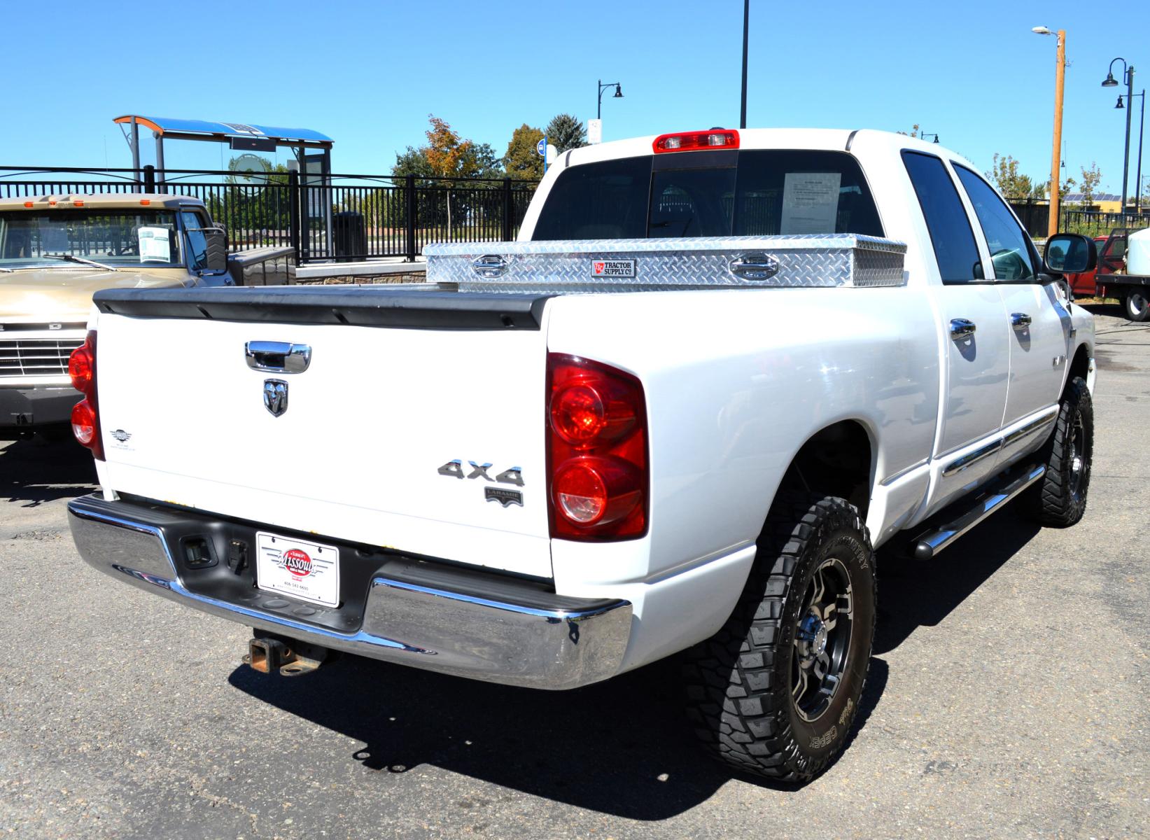 2008 White Dodge Ram 1500 Laramie Quad Cab 4WD (1D7HU18208S) with an 5.7L V8 OHV 16V engine, 5-Speed Automatic Overdrive transmission, located at 450 N Russell, Missoula, MT, 59801, (406) 543-6600, 46.874496, -114.017433 - Clean Truck with Nice Wheels and Tires. 5 Speed Automatic Transmission. Power Sunroof. Heated Power Seats. Premium sound. 6 CD Changer. Air. Cruise. Tilt. Power Windows and Locks. Running Boards.Towing. Tool Box. - Photo #5