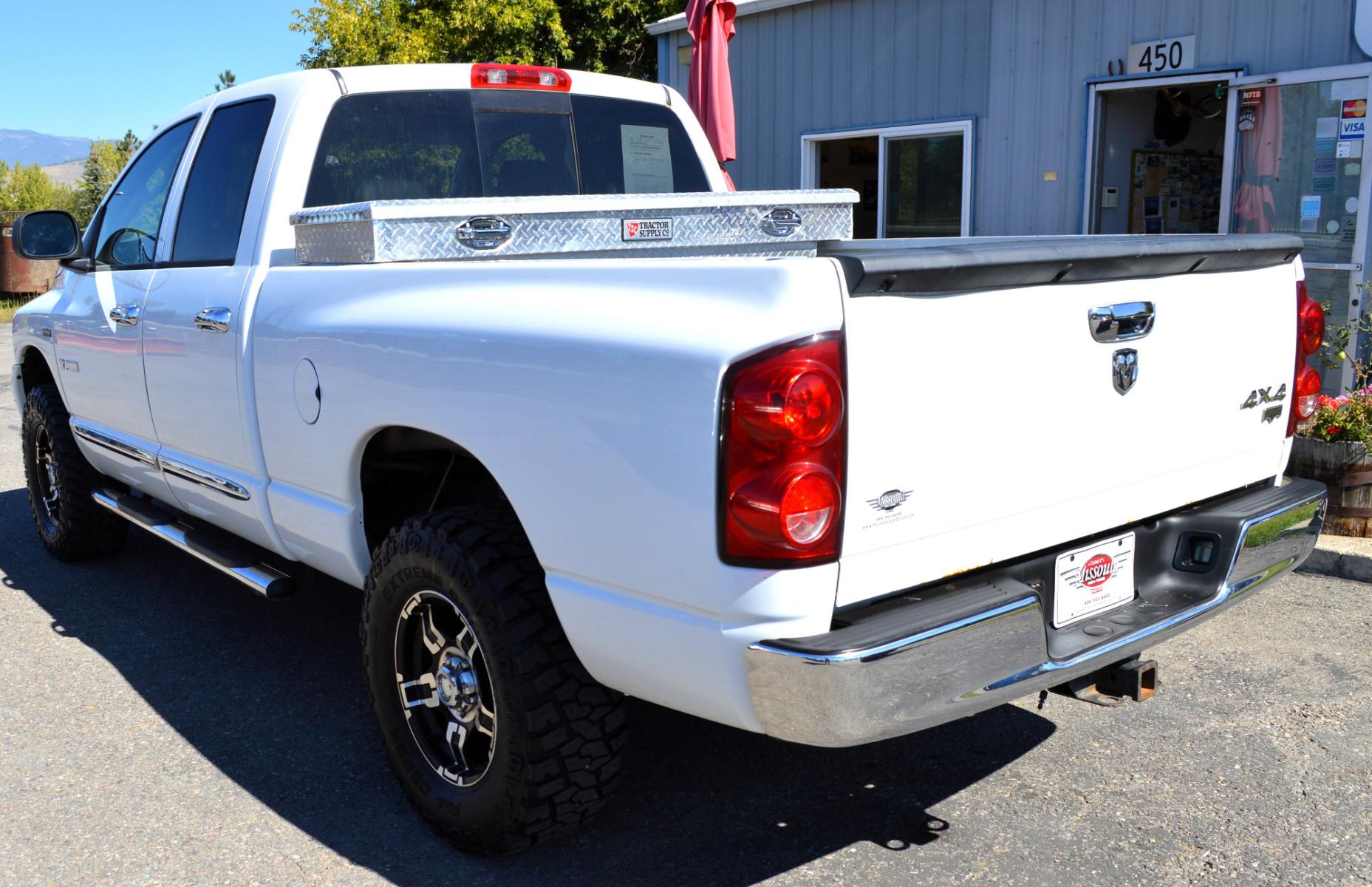 2008 White Dodge Ram 1500 Laramie Quad Cab 4WD (1D7HU18208S) with an 5.7L V8 OHV 16V engine, 5-Speed Automatic Overdrive transmission, located at 450 N Russell, Missoula, MT, 59801, (406) 543-6600, 46.874496, -114.017433 - Clean Truck with Nice Wheels and Tires. 5 Speed Automatic Transmission. Power Sunroof. Heated Power Seats. Premium sound. 6 CD Changer. Air. Cruise. Tilt. Power Windows and Locks. Running Boards.Towing. Tool Box. - Photo #7