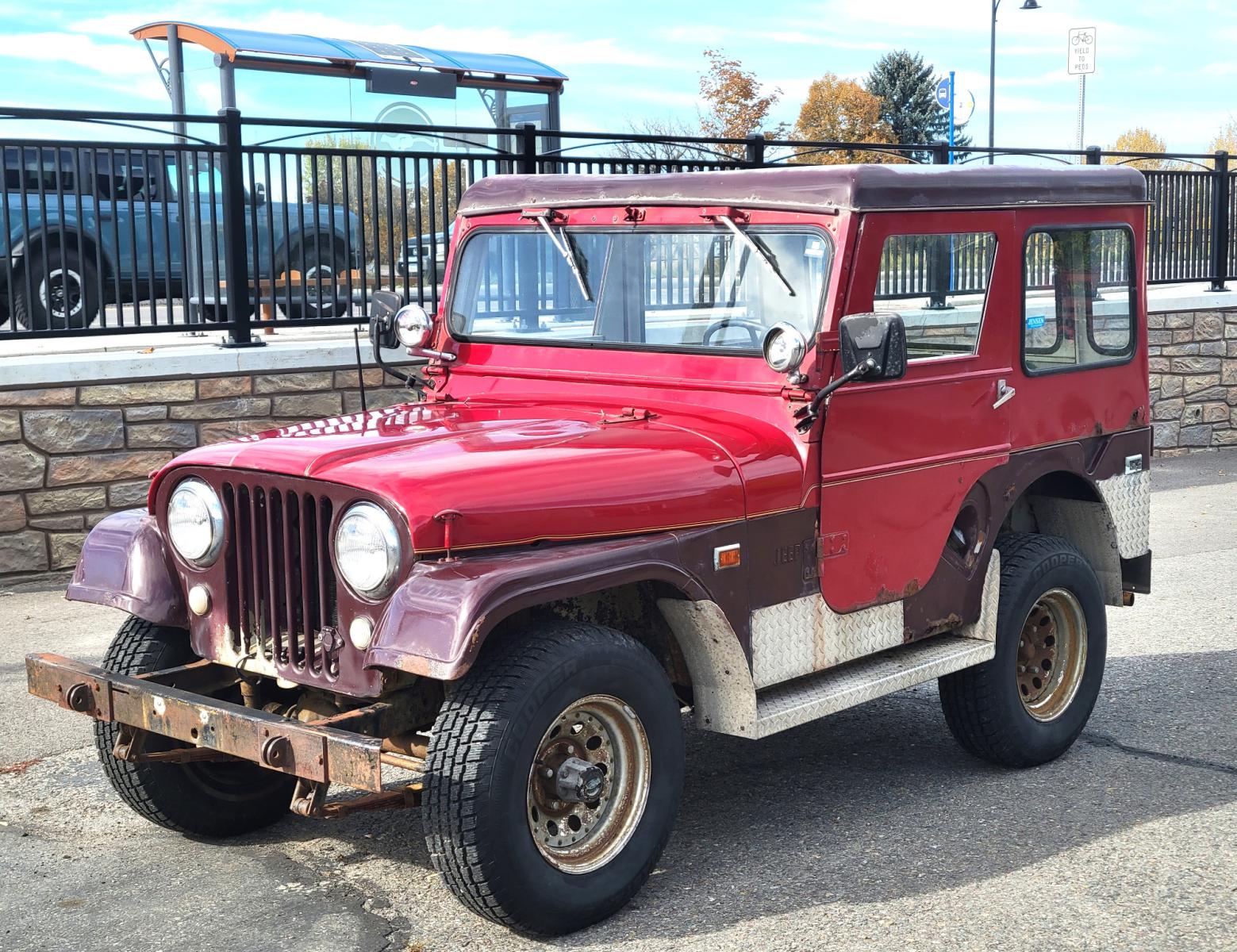 1965 Red American Motors Jeep (8305189188) with an 4 cylinder engine, 3 Speed Manual transmission, located at 450 N Russell, Missoula, MT, 59801, (406) 543-6600, 46.874496, -114.017433 - Photo #0